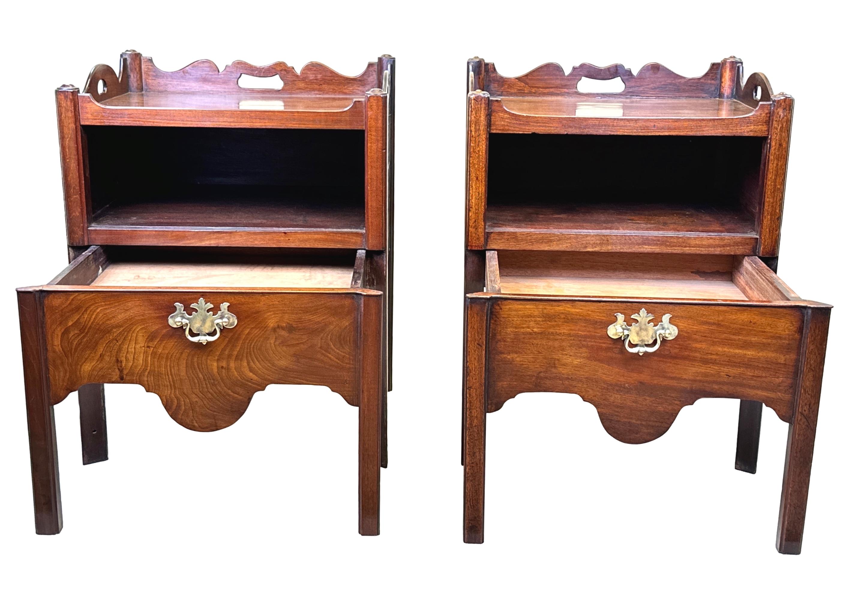 A Very Good Quality And Extremely Well Matched Pair Of 18th Century, George II Period, Mahogany Bedside Night Tables, Or Tray Top Commodes, Having Well Figured Tops With Shaped Gallery Sides And Pierced Handles, Above Unusual Open Storage Cavities