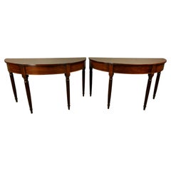 pair of Georgian mahogany demi lune console tables