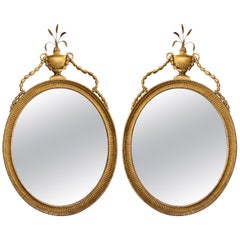 Pair of Georgian Oval Giltwood Mirrors