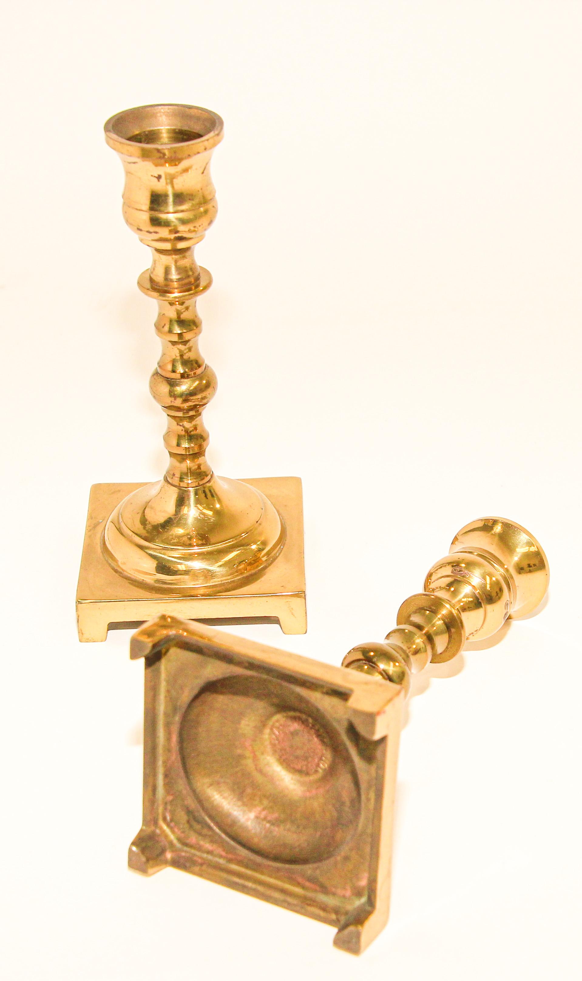 British Pair of Georgian Polished Brass Candle Holder For Sale