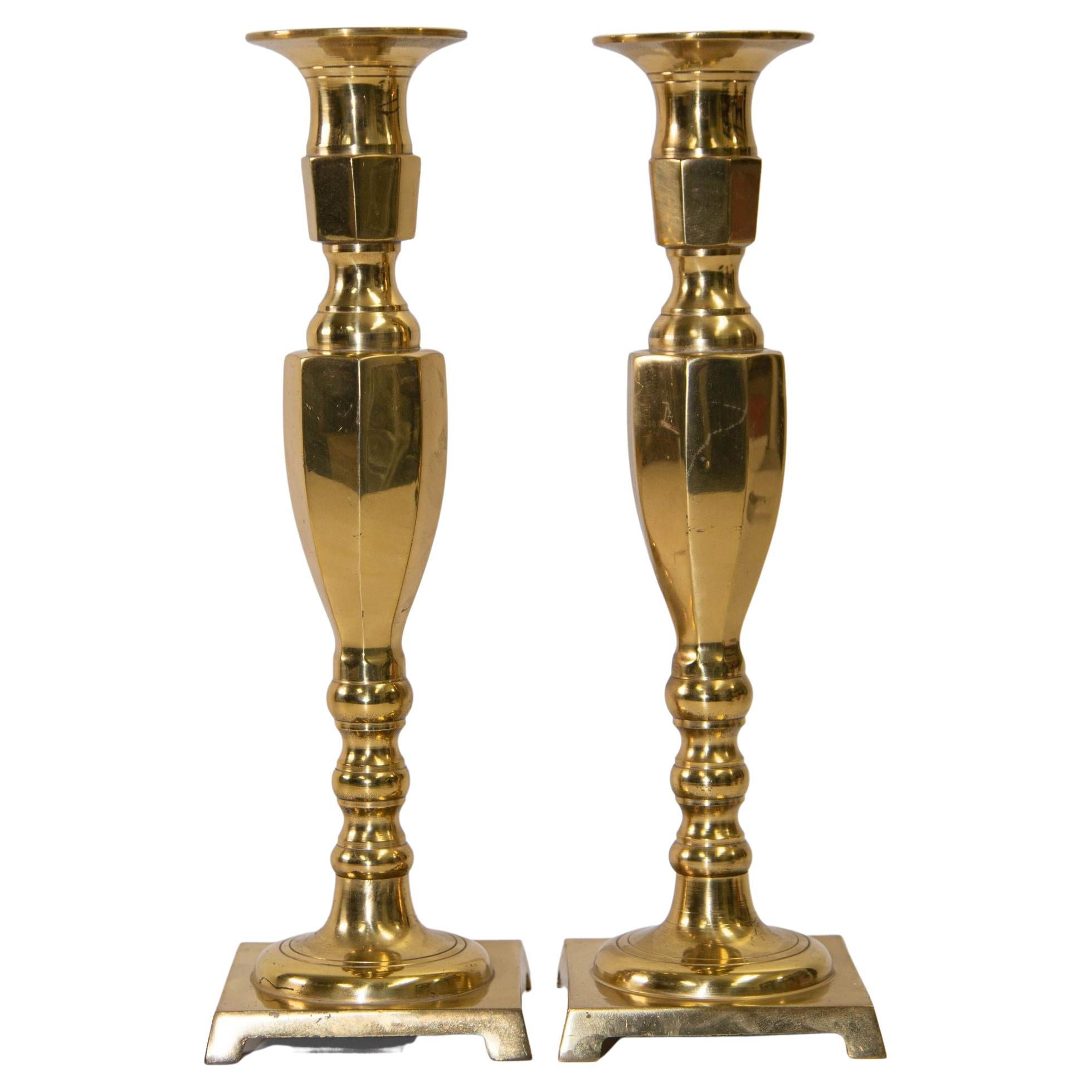 Pair of Georgian Polished Brass Candlesticks For Sale