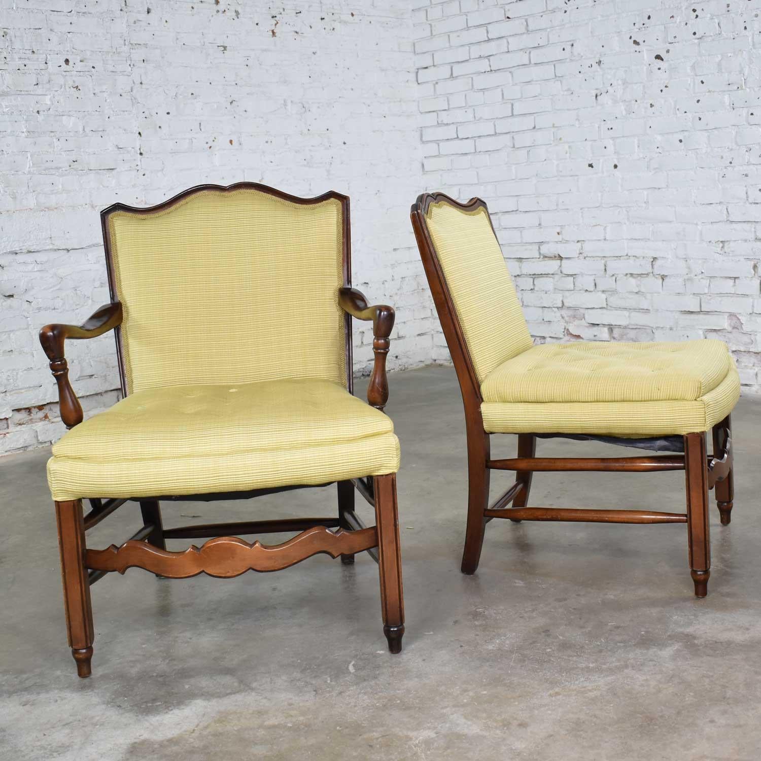 Handsome pair of Georgian Revival his and hers accent chairs in golden yellow upholstery. They are in wonderful recently recovered condition. The wood has nice wear and patina to their original finish. Please see photos, circa mid-20th