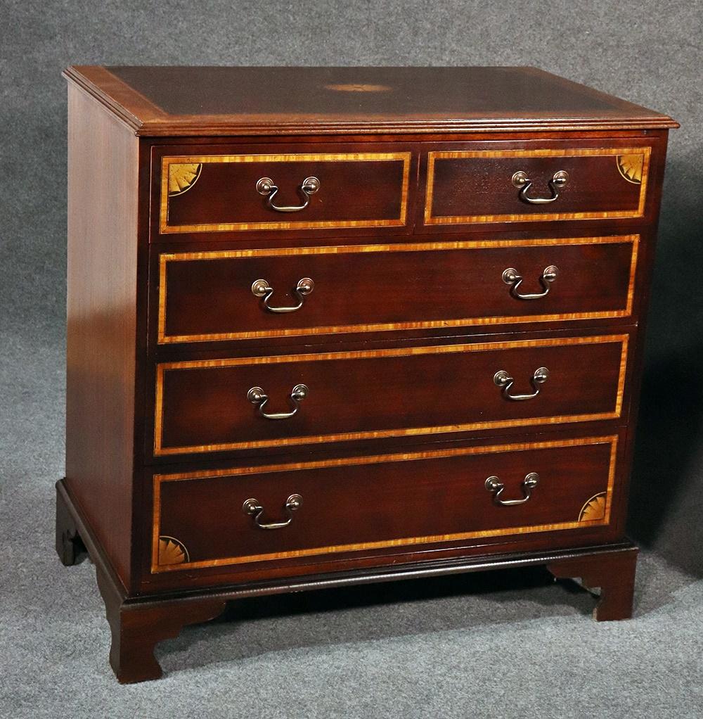 Pair of inlaid satinwood and mahogany Georgian style 5-drawer commodes.