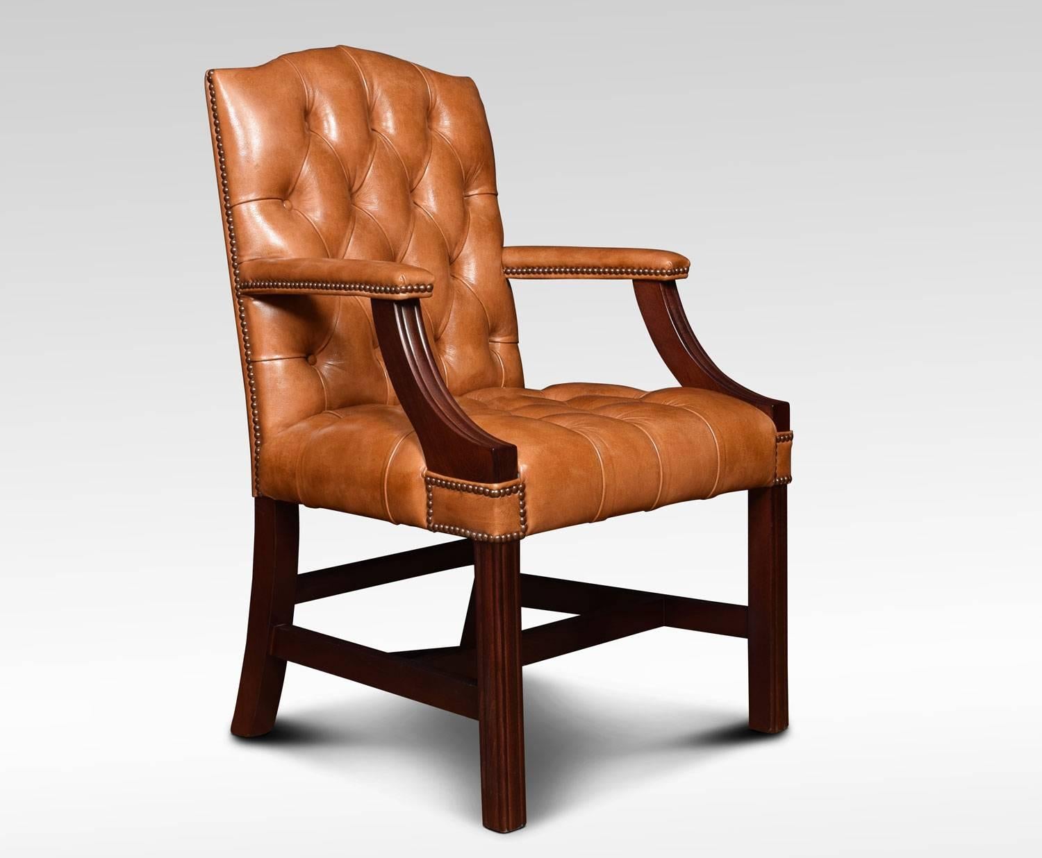 Pair of Georgian style leather Gainsborough library chairs, having deep buttoned brown leather backs and seats with brass studded edges. The solid mahogany framed standing on square legs, united by stretcher.
Dimensions:
Height 39.5 inches, height