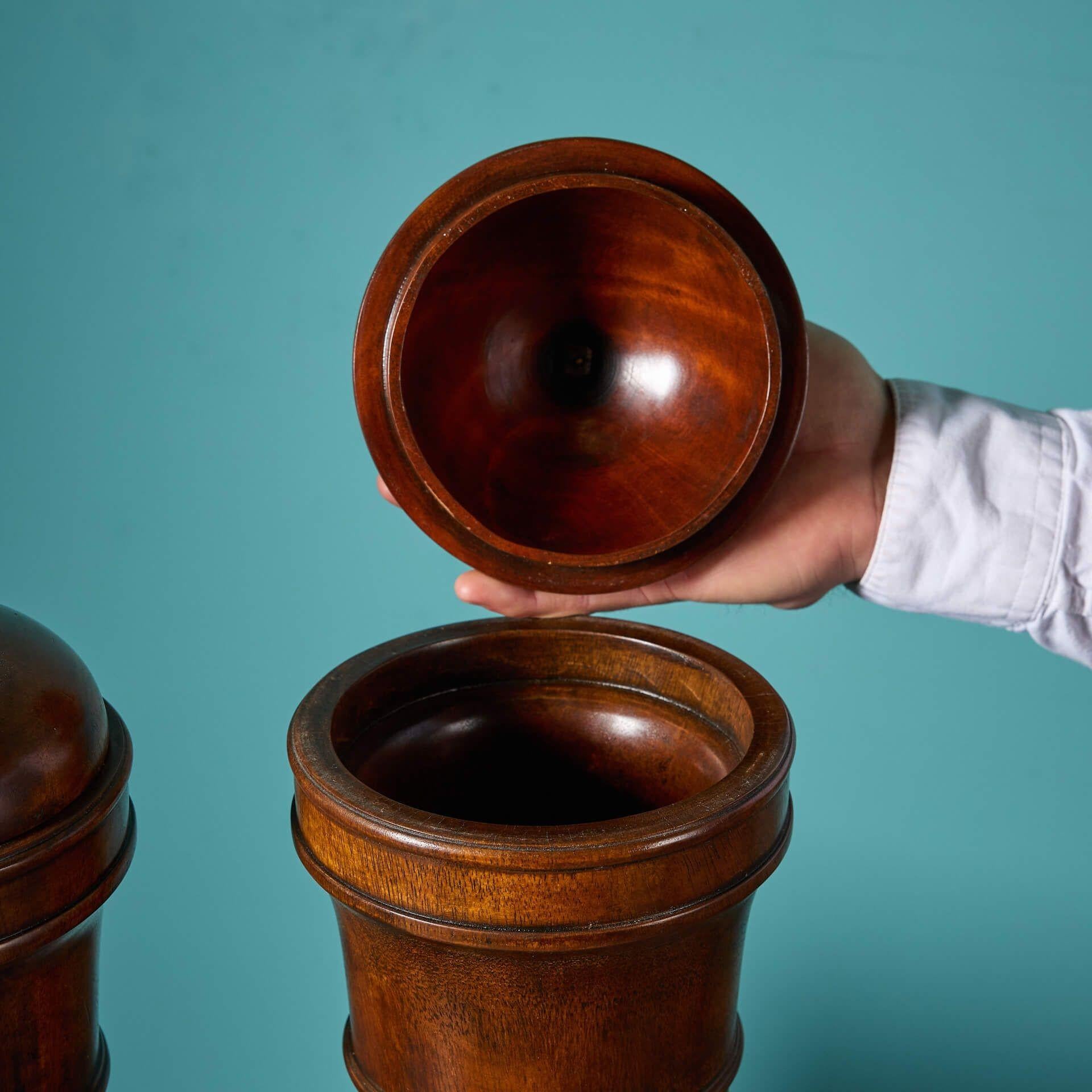 20th Century Pair of Georgian Style lidded Mahogany Urns For Sale