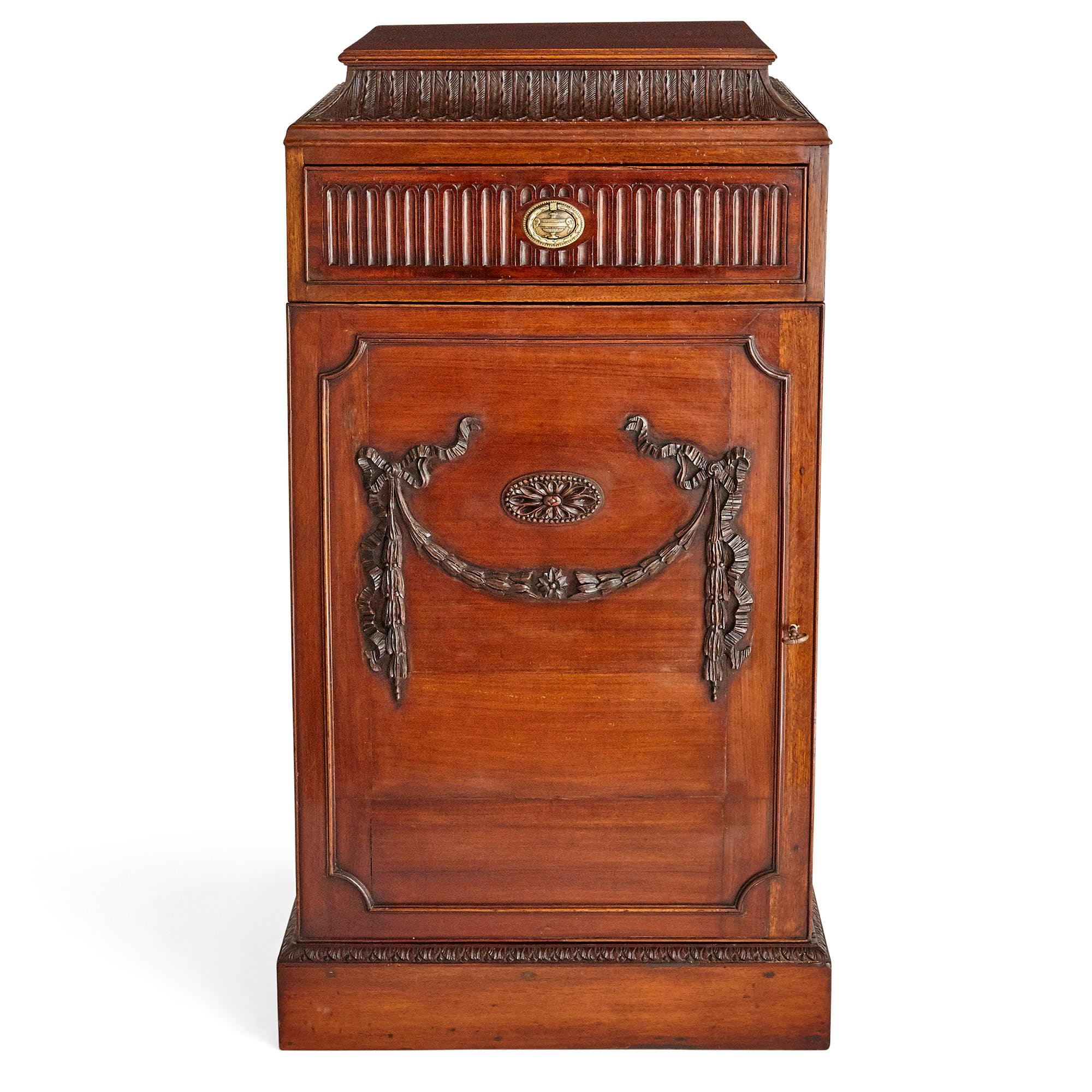 Pair of Georgian style mahogany cabinet stands
English, 19th Century
Height 110cm, width 60cm, depth 55cm

Each mahogany cabinet in this pair is crafted in the style popular during the reign of George III, namely a refined classicism. Each unit,