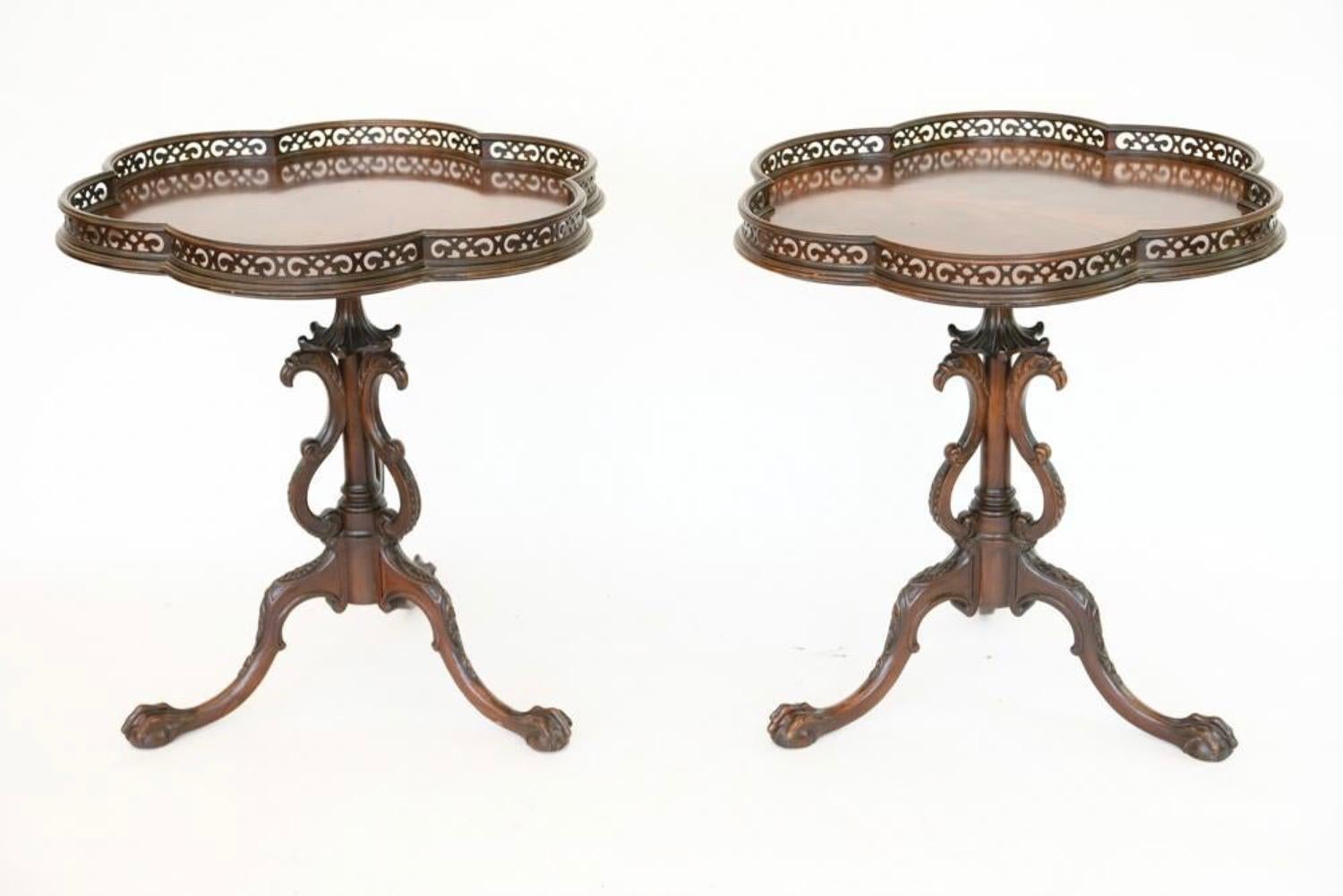 Elegant and stylish, these scalloped or pie shaped gallery top occasional end tables with wonderfully elaborately carved center support are made by Grand Rapids Furniture Company with label underneath.
In 1902, furniture companies in Grand Rapids
