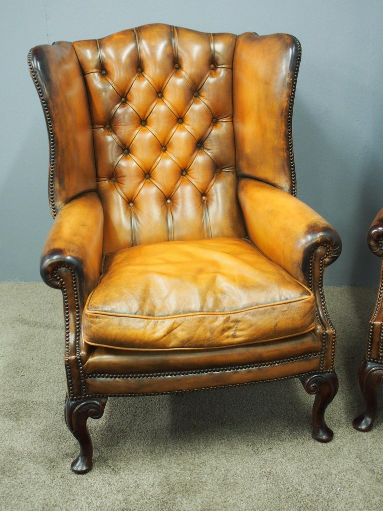 Pair of Style, Tan Leather Wing Chairs at 1stDibs