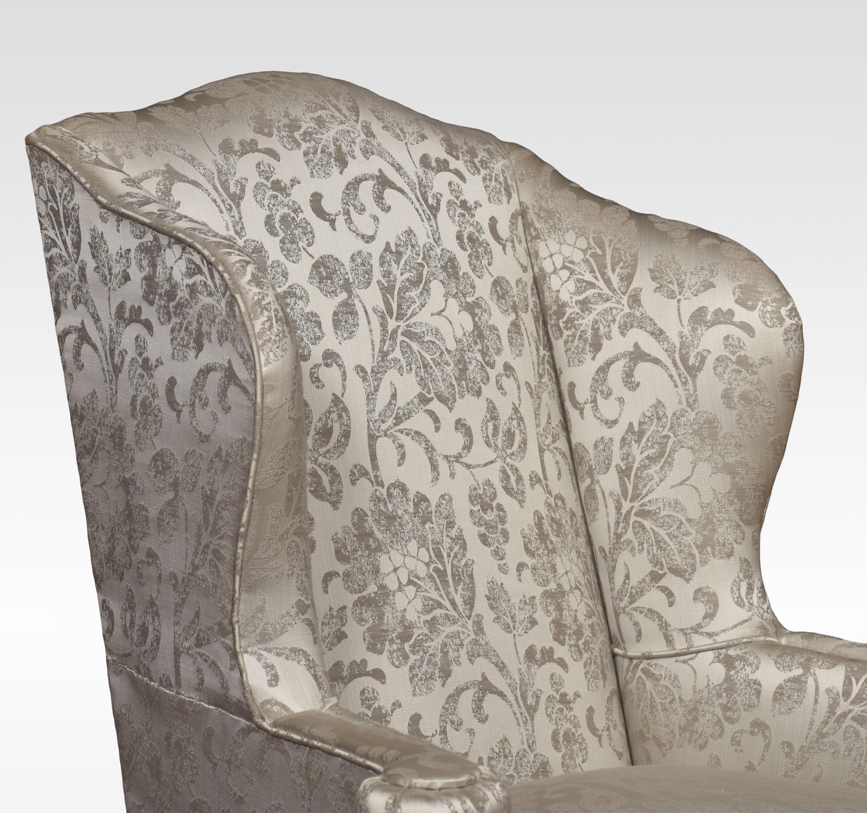 A pair of Georgian-style armchairs, the winged back, and upholstered seat, flaked by outswept arms. All raised up on shell capped cabriole front sports.
Dimensions
Height 46 inches Height to seat 23 inches
Width 33 inches
Depth 31 inches.
