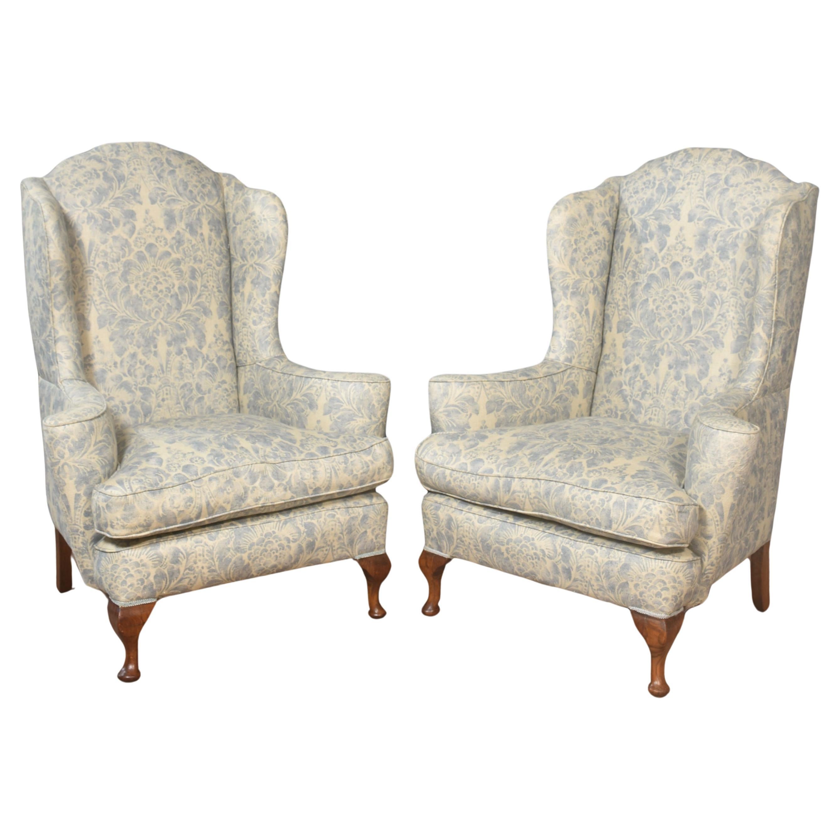 Pair of Georgian style wingback armchairs