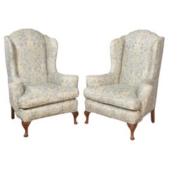 Pair of Georgian style wingback armchairs