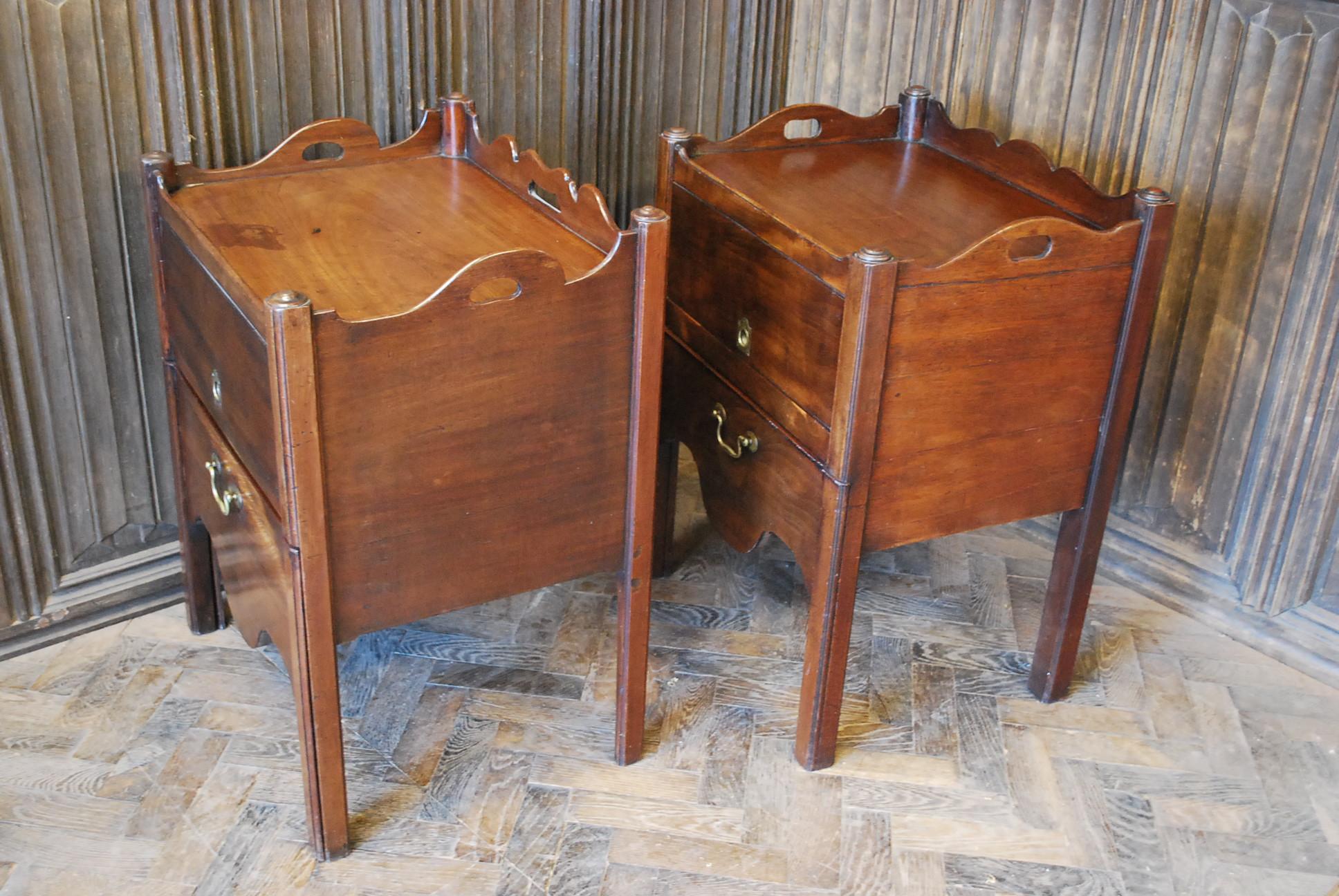 Hutton-Clarke antiques are pleased to offer a matched pair of Georgian tray-top commodes, circa 1780. Lift up sliding doors and converted bases with tooled leather inserts. A rare pair to find being English.