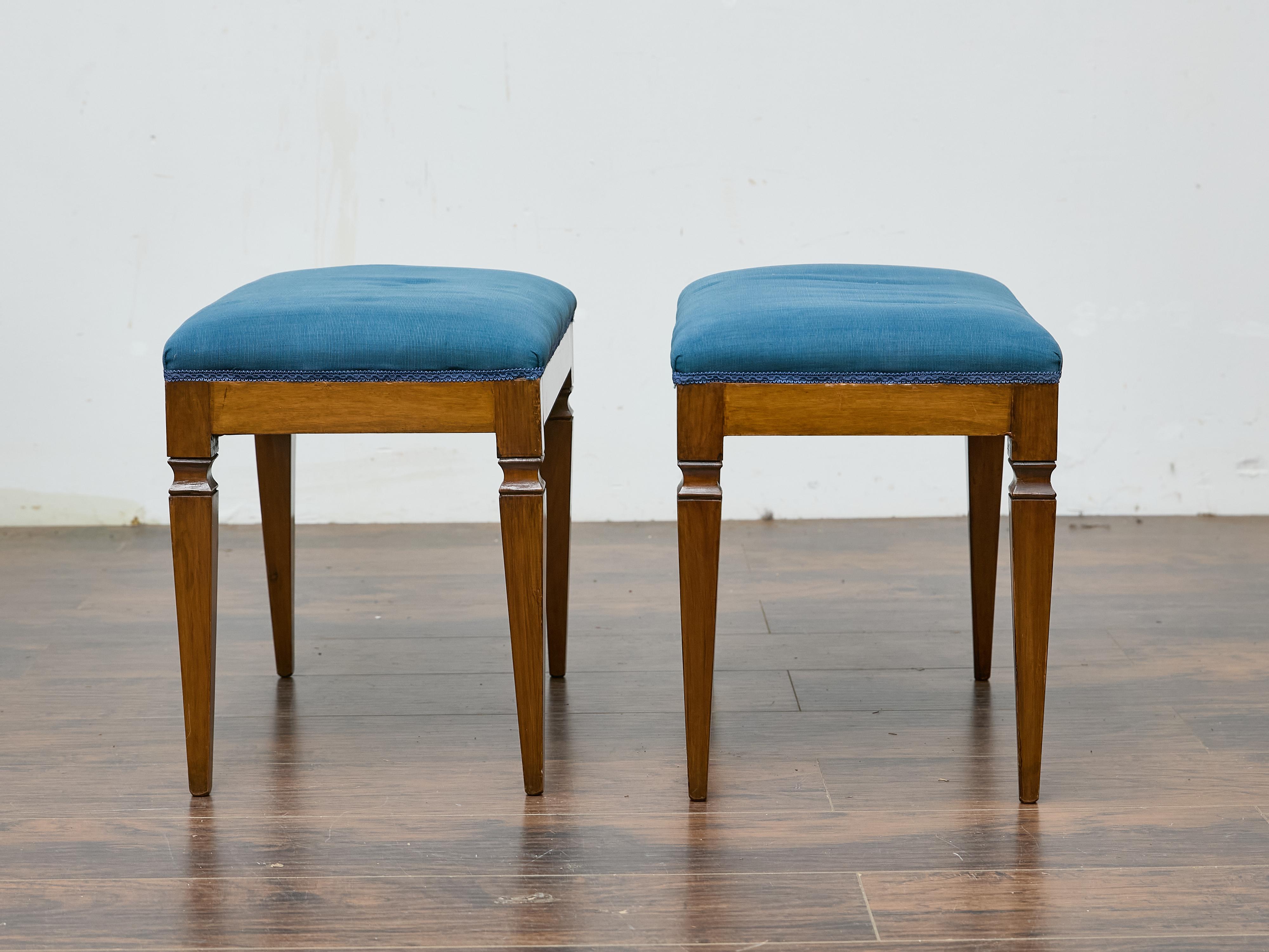 Carved Pair of German Biedermeier Benches with Blue Upholstery and Tapered Legs