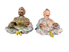 Pair of German Chinoiserie Porcelain Figures of Seated "Nodders"