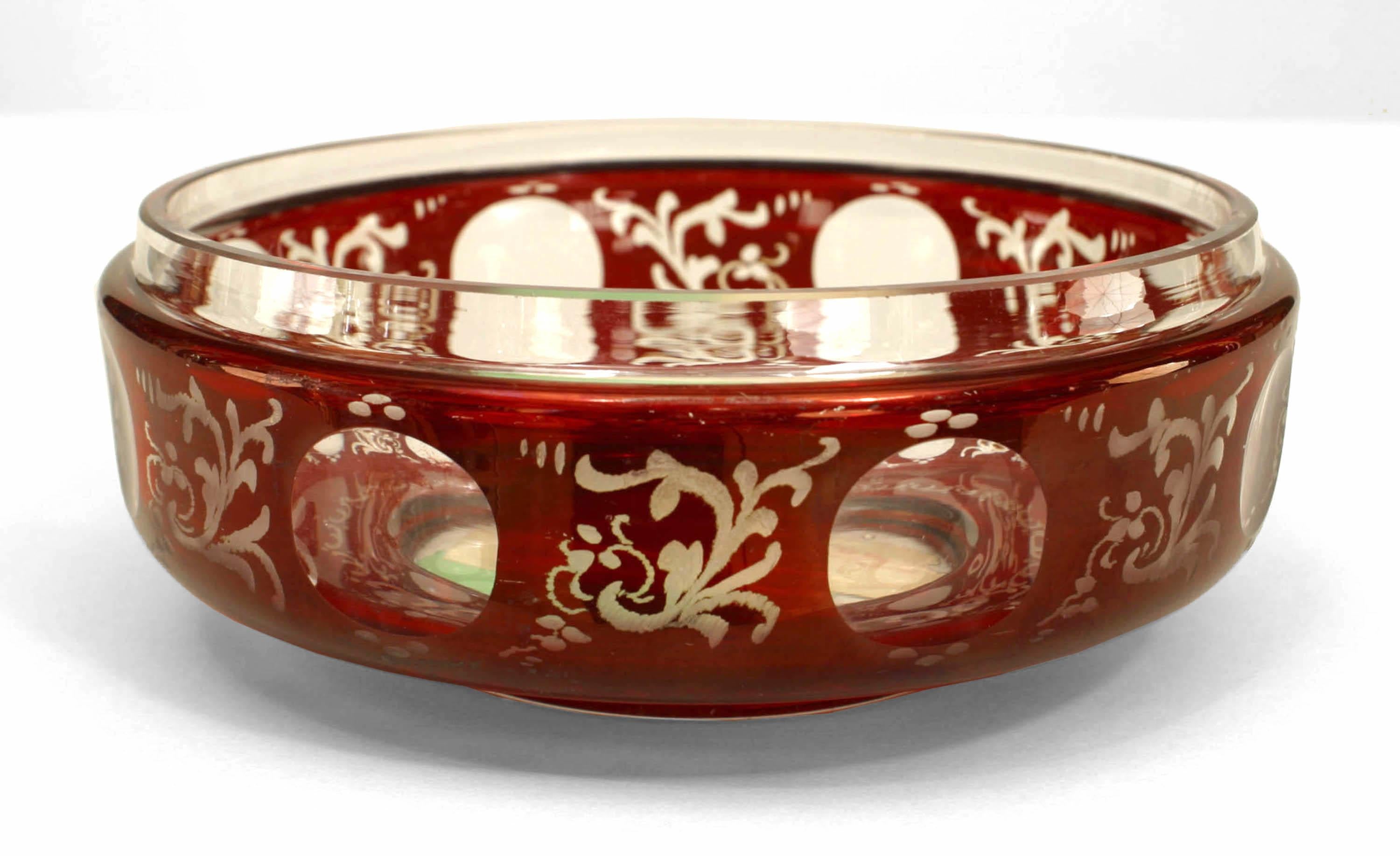 Pair of German (19th century) round shaped cranberry and etched glass boxes with cover and floral and deer design (priced as pair).
      