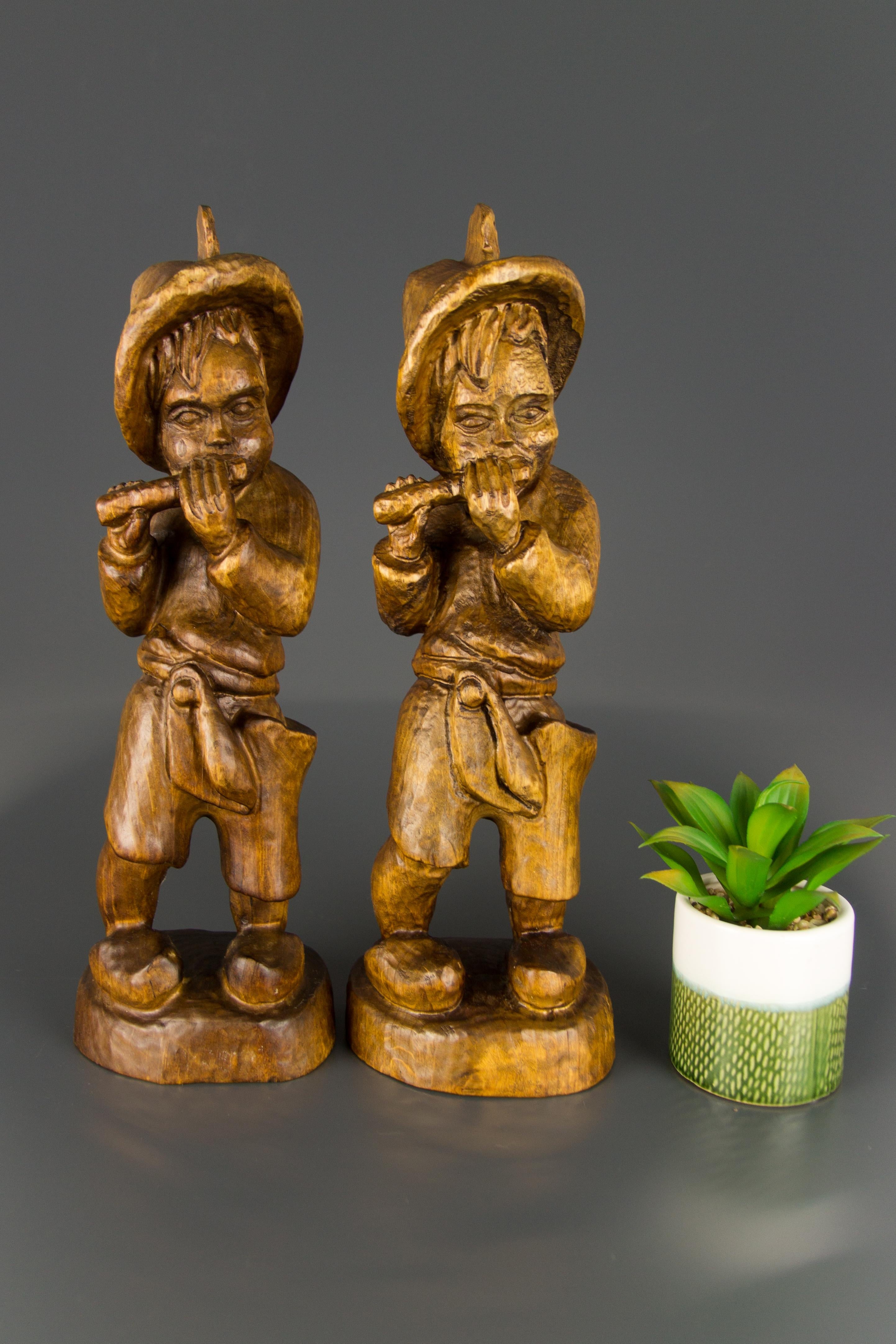 Folk Art Pair of German Hand Carved Wood Figurative Sculptures of Two Boys Musicians For Sale