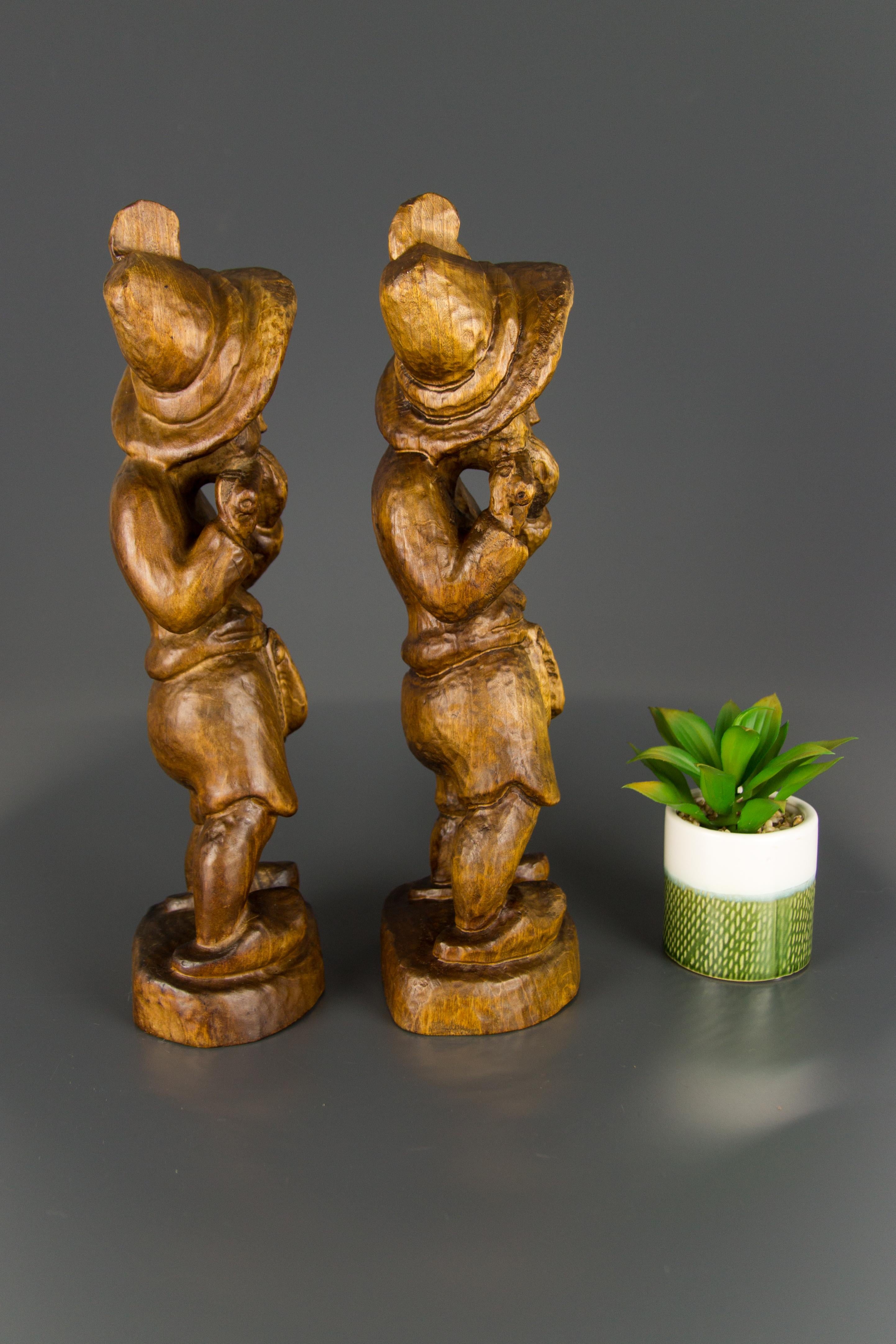 Mid-20th Century Pair of German Hand Carved Wood Figurative Sculptures of Two Boys Musicians For Sale