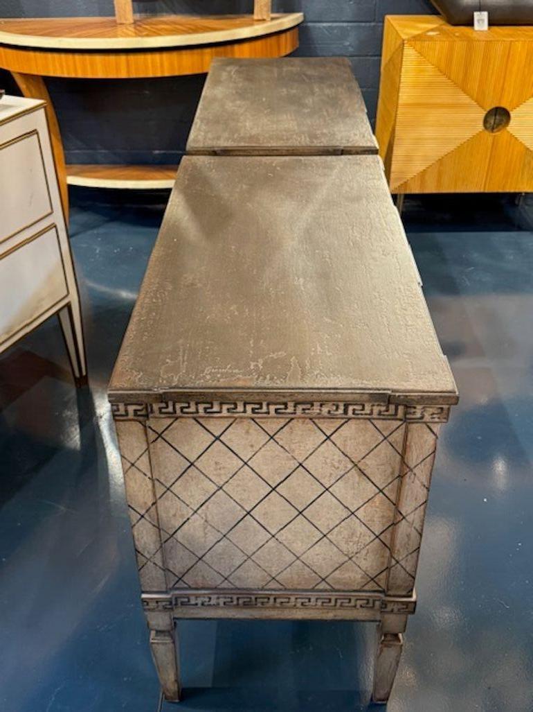 Good pair of German Neo-Classical hand painted bed side tables. Each pair is a conversation piece—ideal for flanking a bed, anchoring a reading nook, or even adding flair to a hallway. 38W x 19D x 32.5D