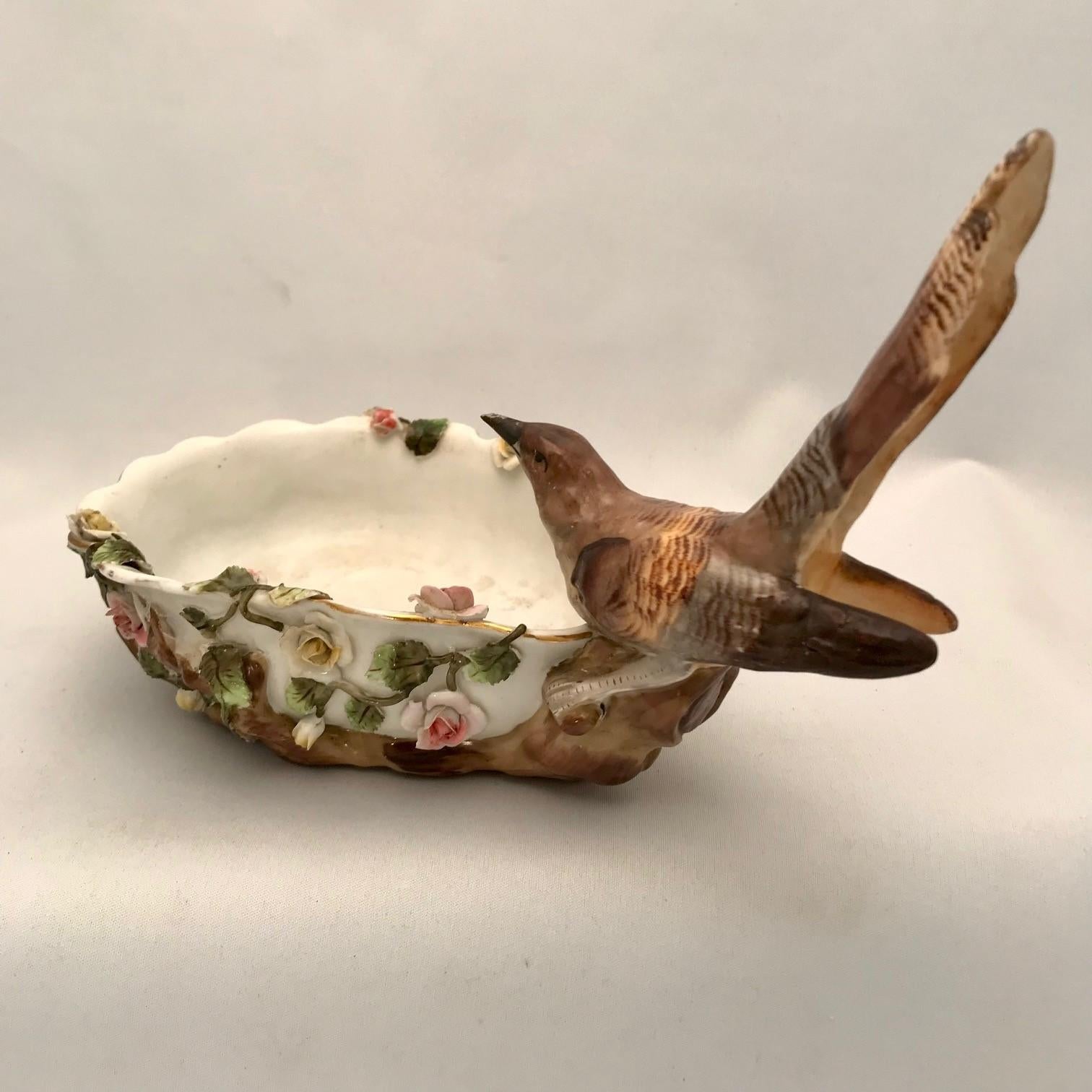Hand-Painted Pair of German Shaped Dessert Dishes Each Modelled with a Bird Amidst Flowers For Sale