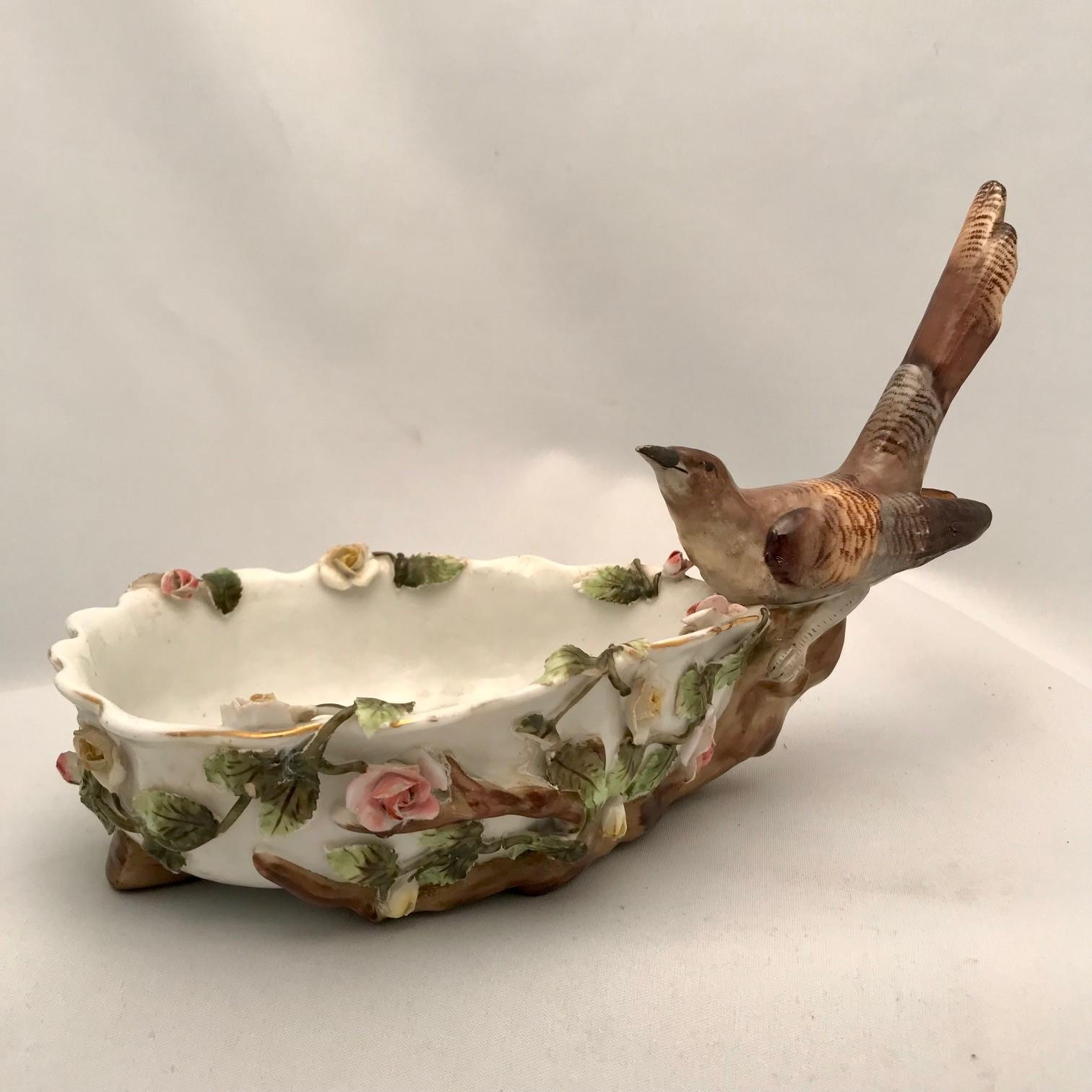 Porcelain Pair of German Shaped Dessert Dishes Each Modelled with a Bird Amidst Flowers For Sale