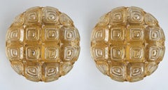 Coppia di lampade da soffitto o da parete in vetro ambrato tedesco vintage, anni '60