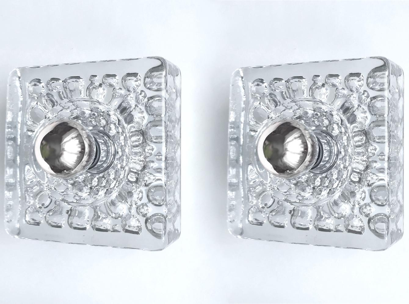 Pair of textured blown glass sconces.
Germany, 1960s - 1970s
Lamp sockets: 1.