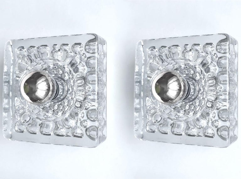 Pair of textured blown glass sconces.
Germany, 1960s - 1970s
Lamp sockets: 1.
