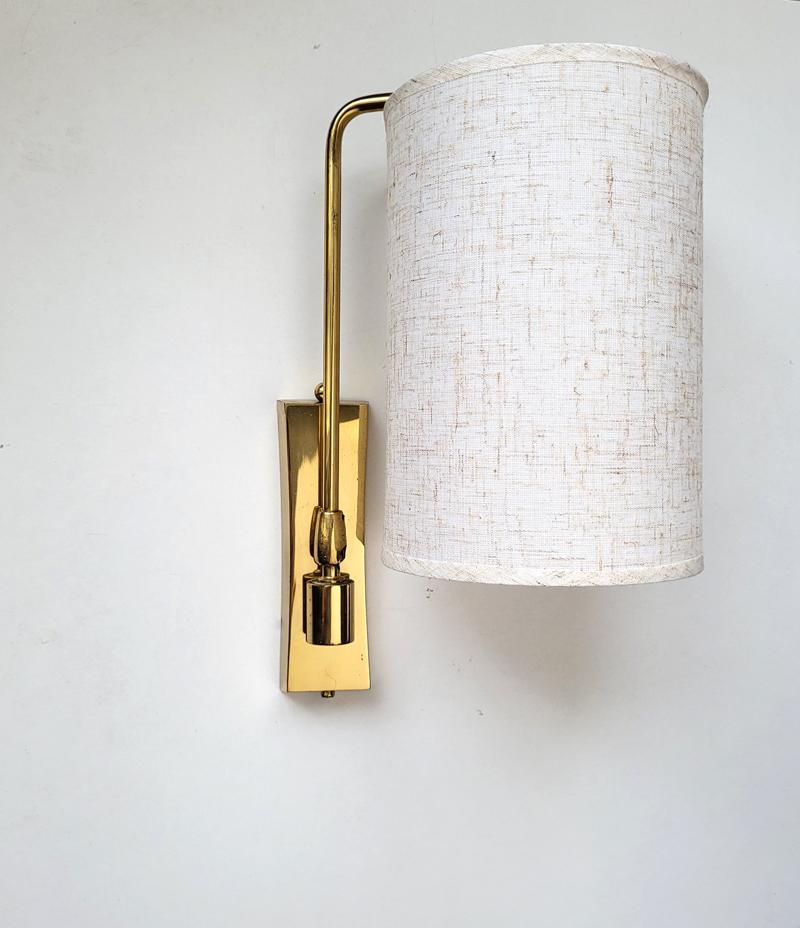 Paire d'élégantes appliques articulées.
Allemagne, années 1960.

Douilles de lampe : 1x E27 (US E26).
