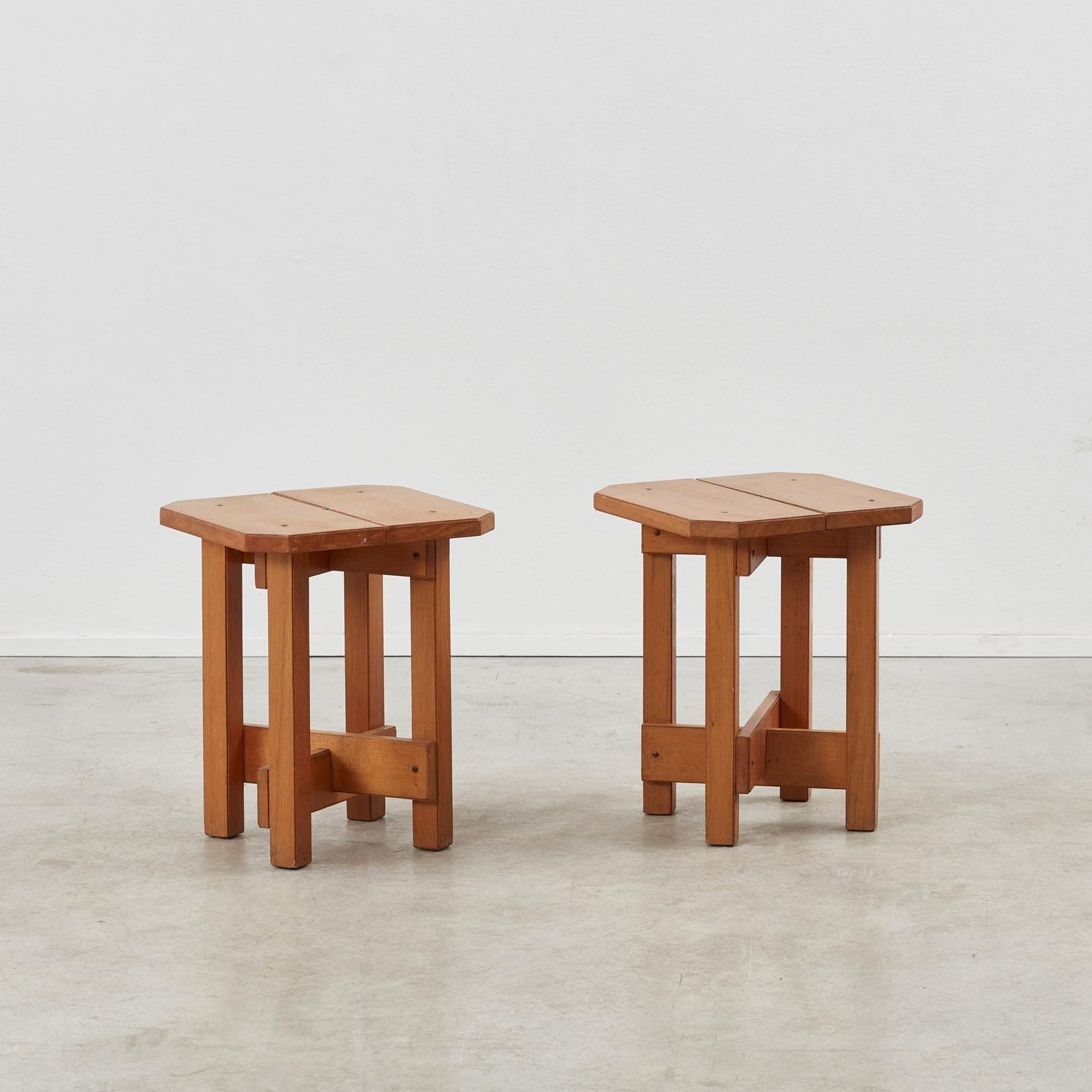 Pair of stools or side tables, design attributed to Dutch architect Gerrit Rietveld. They were made in the 1970s from plywood and oak and sold in pairs. Rietveld’s designs were open source, releasing his drawings for people to make their own. There