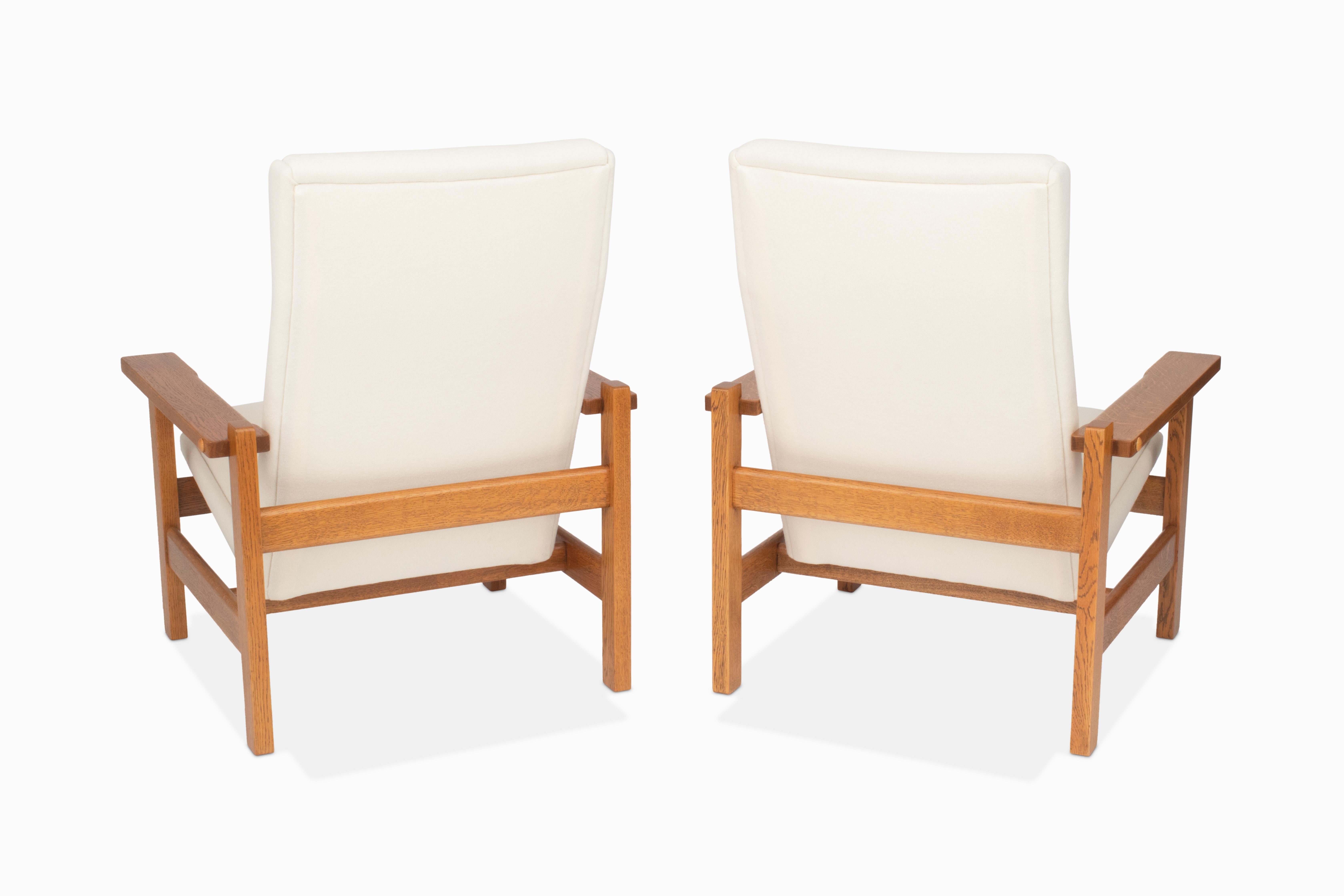 Wool Pair of Getama GE-163a Oak Lounge Chairs by Hans Wegner For Sale