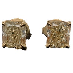 Pair of GIA Yellow Radiants, Total Weight 2.11 Carat in 18 Karat Gold