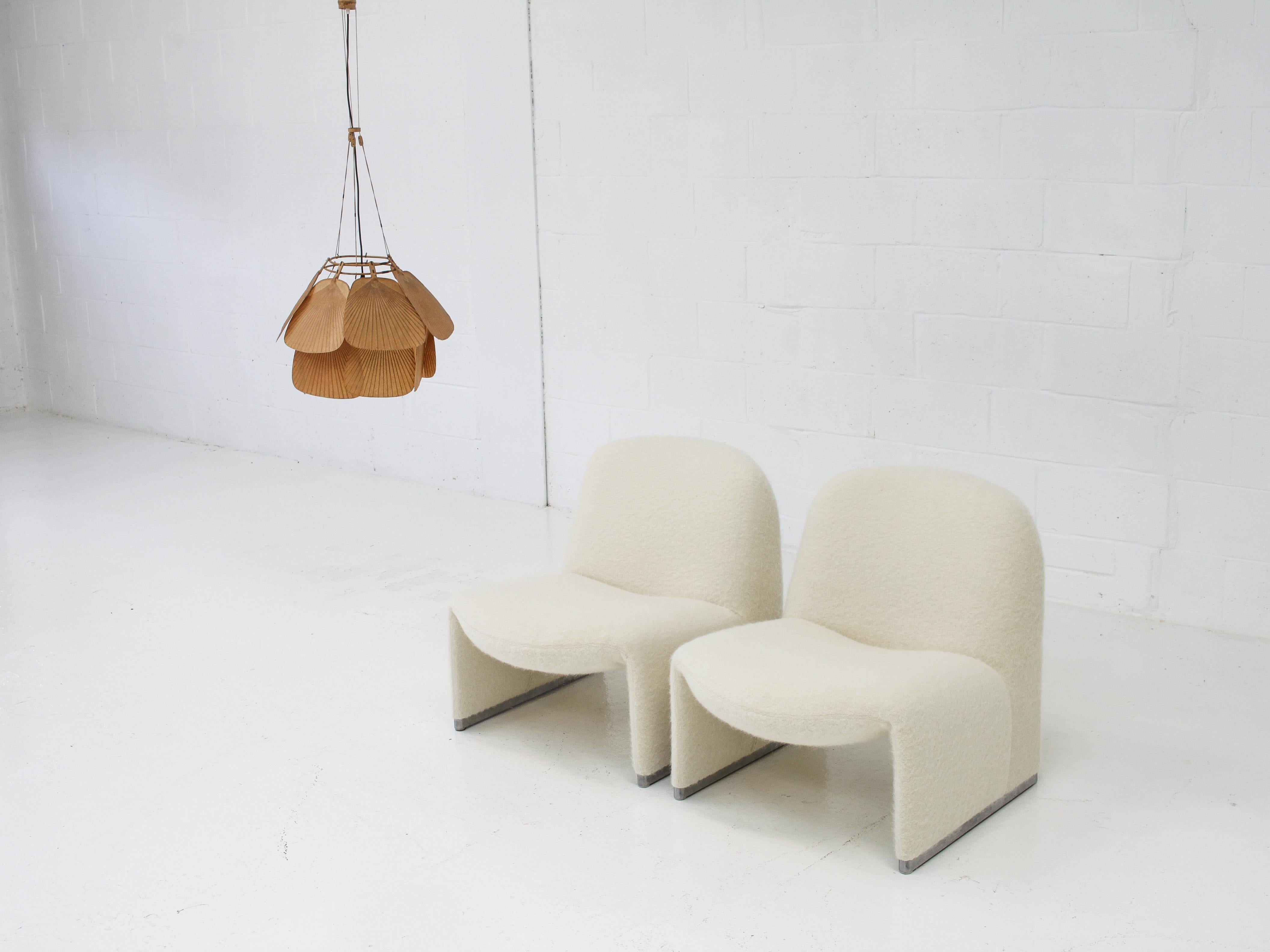A pair of Giancarlo Piretti “Alky” chairs newly upholstered in fluffy wool, mohair and alpaca fabric which is produced by one of the most luxurious fabric manufacturers in the world, Pierre Frey.

Manufactured by Artifort in the 1970s.

The