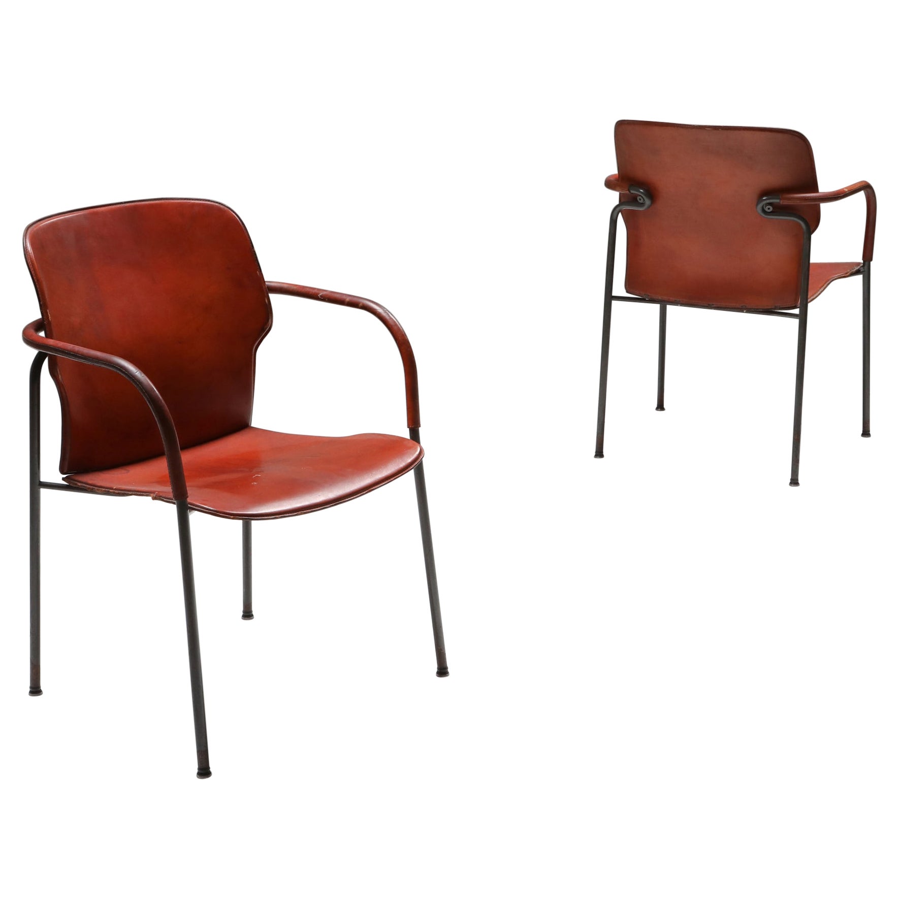 Coppia di poltrone Gianfranco Frattini modello 'Lalanda' in pelle color cognac scuro