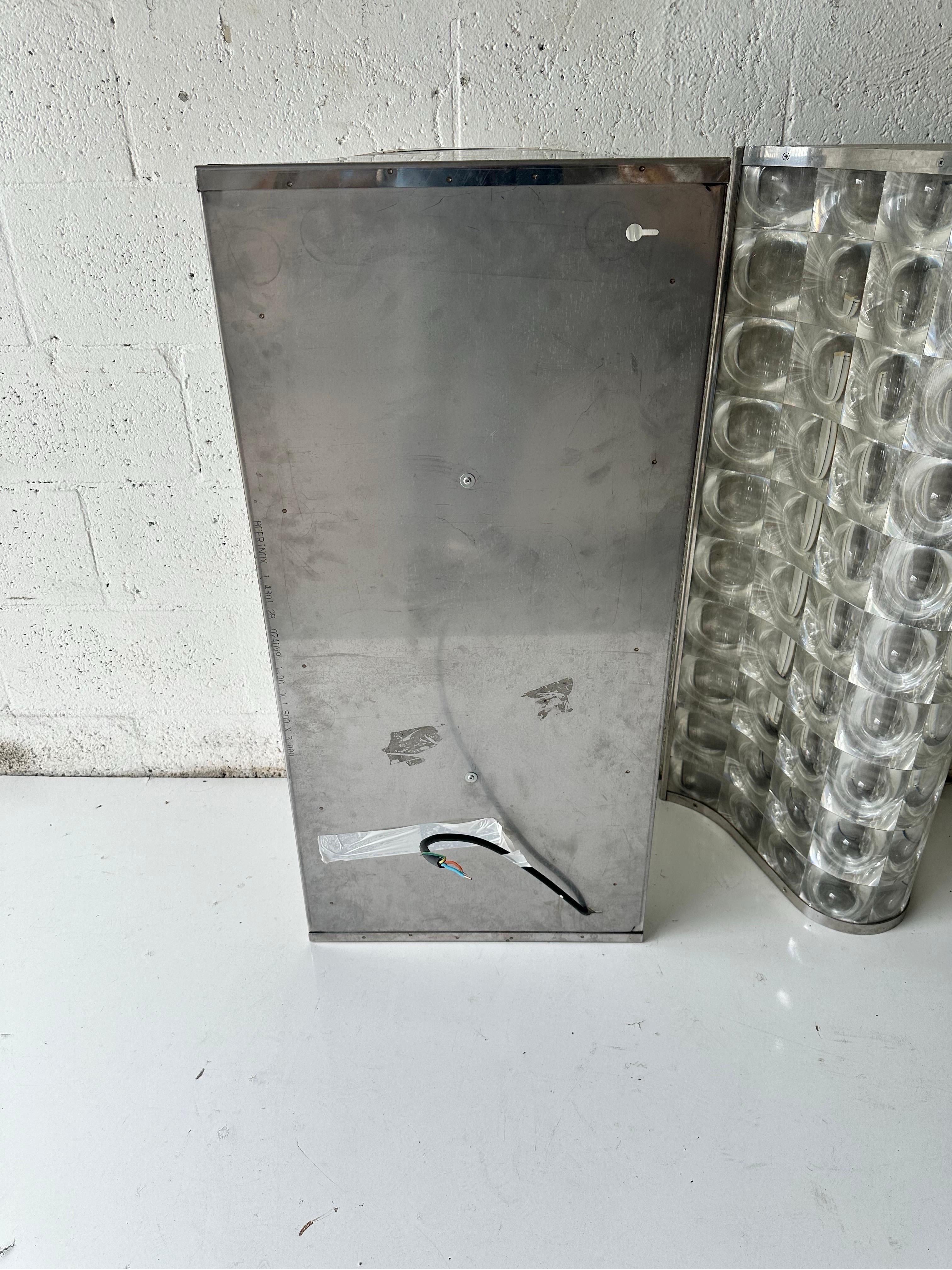 Late 20th Century Pair of gigantic  1970’s  PVC plastic and Chrome Sconces For Sale
