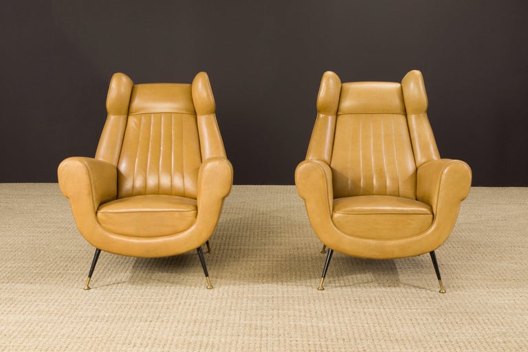 This pair of 1960s Gigi Radice for Minotti leather wingback chairs are currently the gallery owner's favorite pair of armchairs in our collection - a simply stunning and incredibly buttery soft statement piece, these chairs are a must-see to