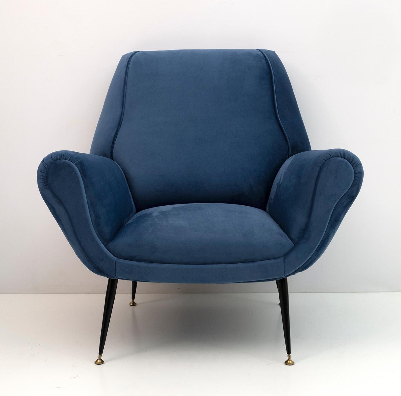 Armchair designed by Gigi Radice for Minotti. Made with solid wood structure and blue velvet upholstery with metal and brass legs. The structure is authentic, only the upholstery and padding have been replaced.