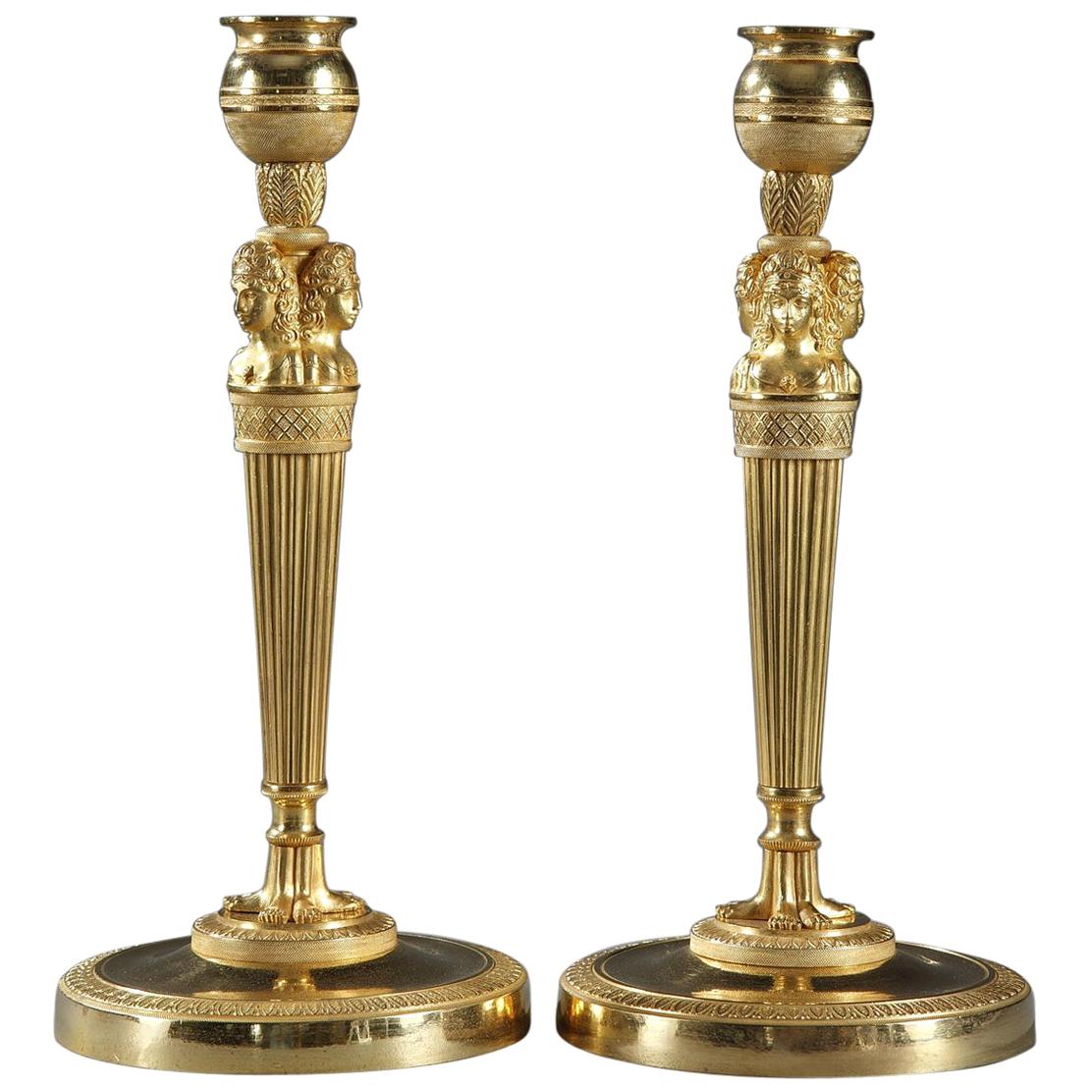 Pair of Gilded and Sculpted Bronze Candlesticks, Empire Period For Sale