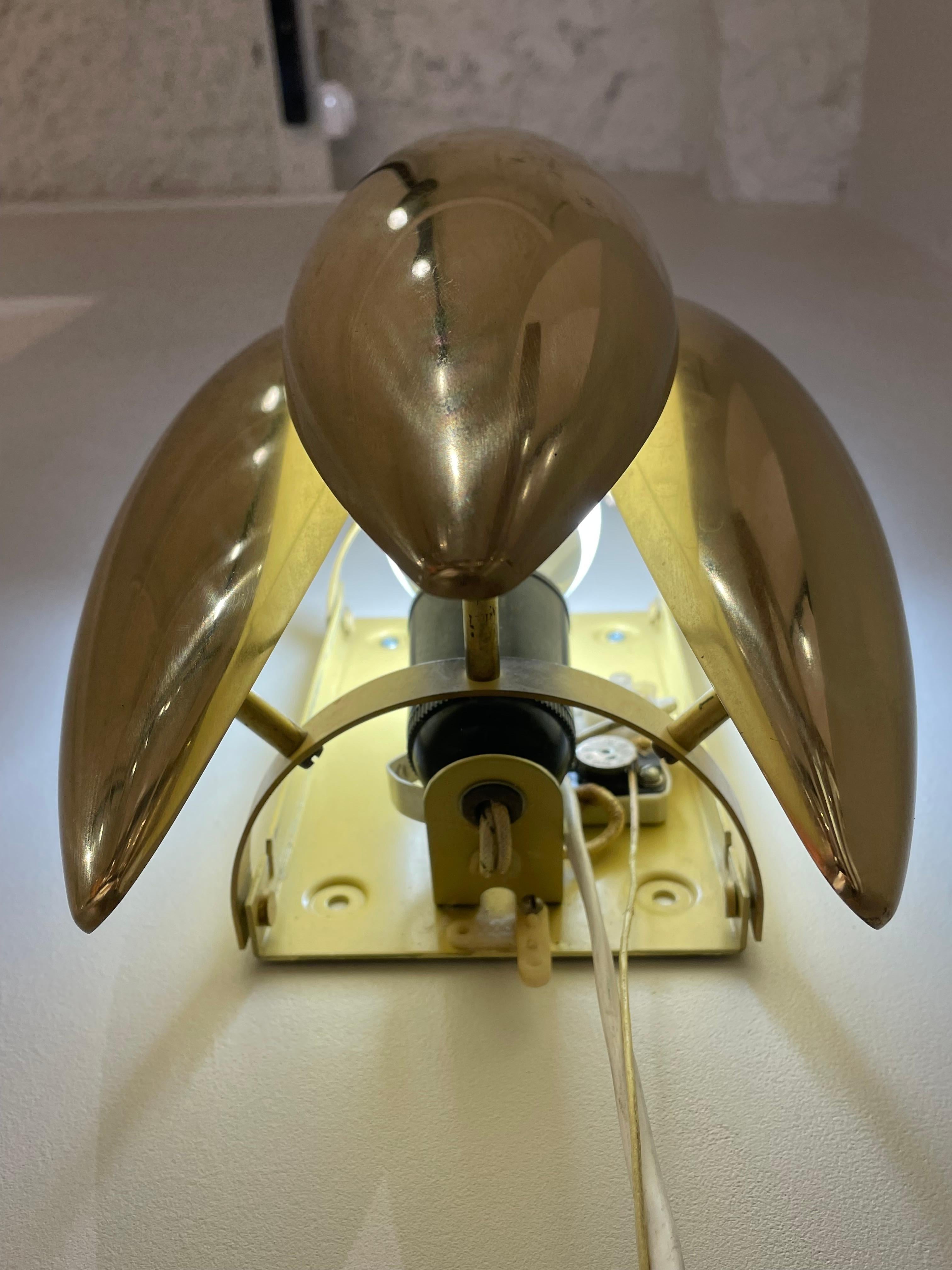 Hand-Crafted Pair of gilded brass sconces For Sale