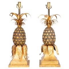 Pareja de lámparas piña de bronce dorado y tole de Warren Kessler