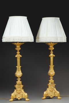 Pair of Gilded Bronze Candlesticks with Saint Decoration, 19th Century