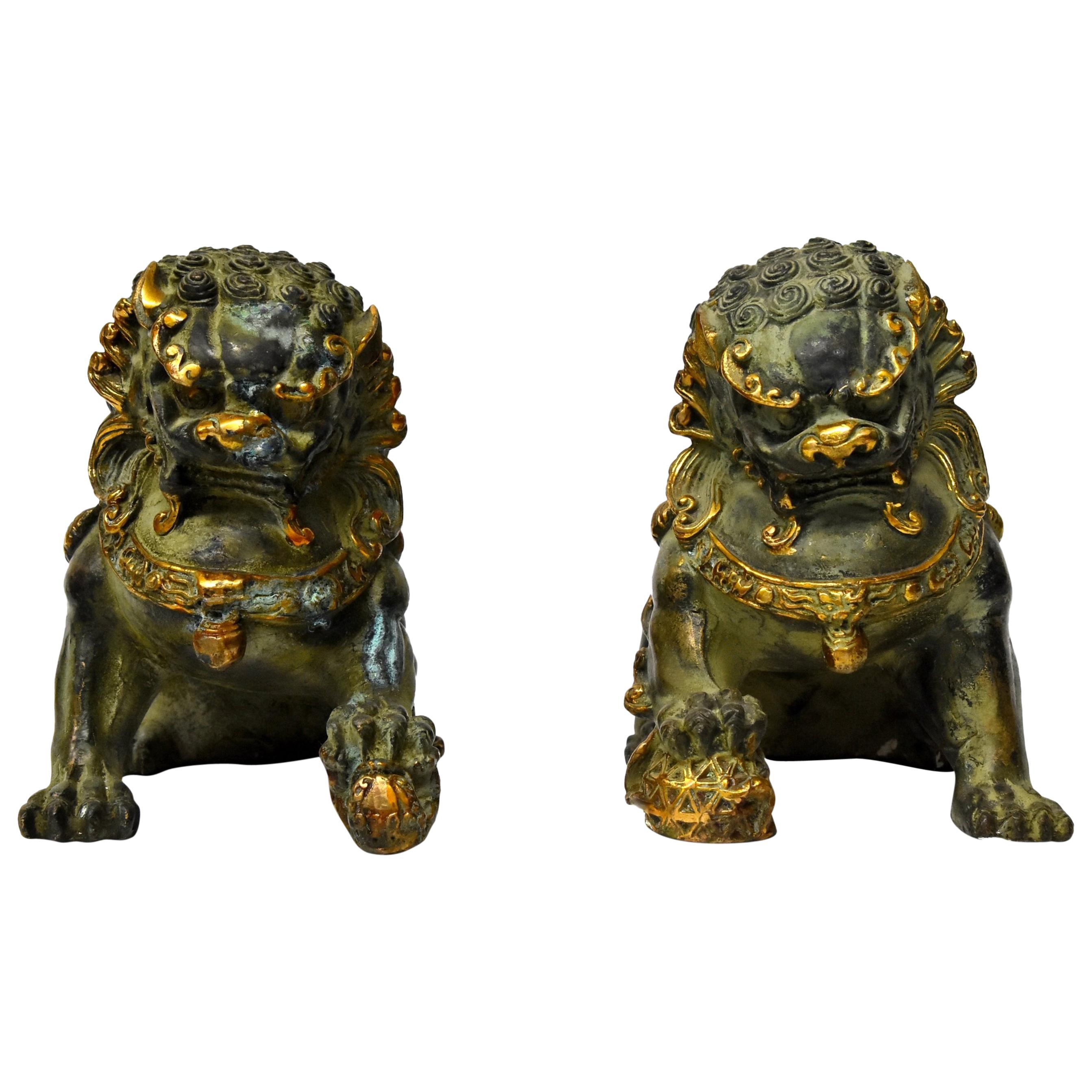 Pair of Gilded Bronze Foo Dogs