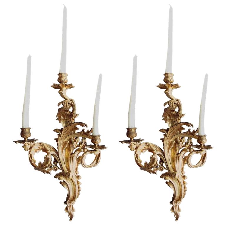 Pair of Gilded Bronze Louis XV Three-Light Sconces For Sale