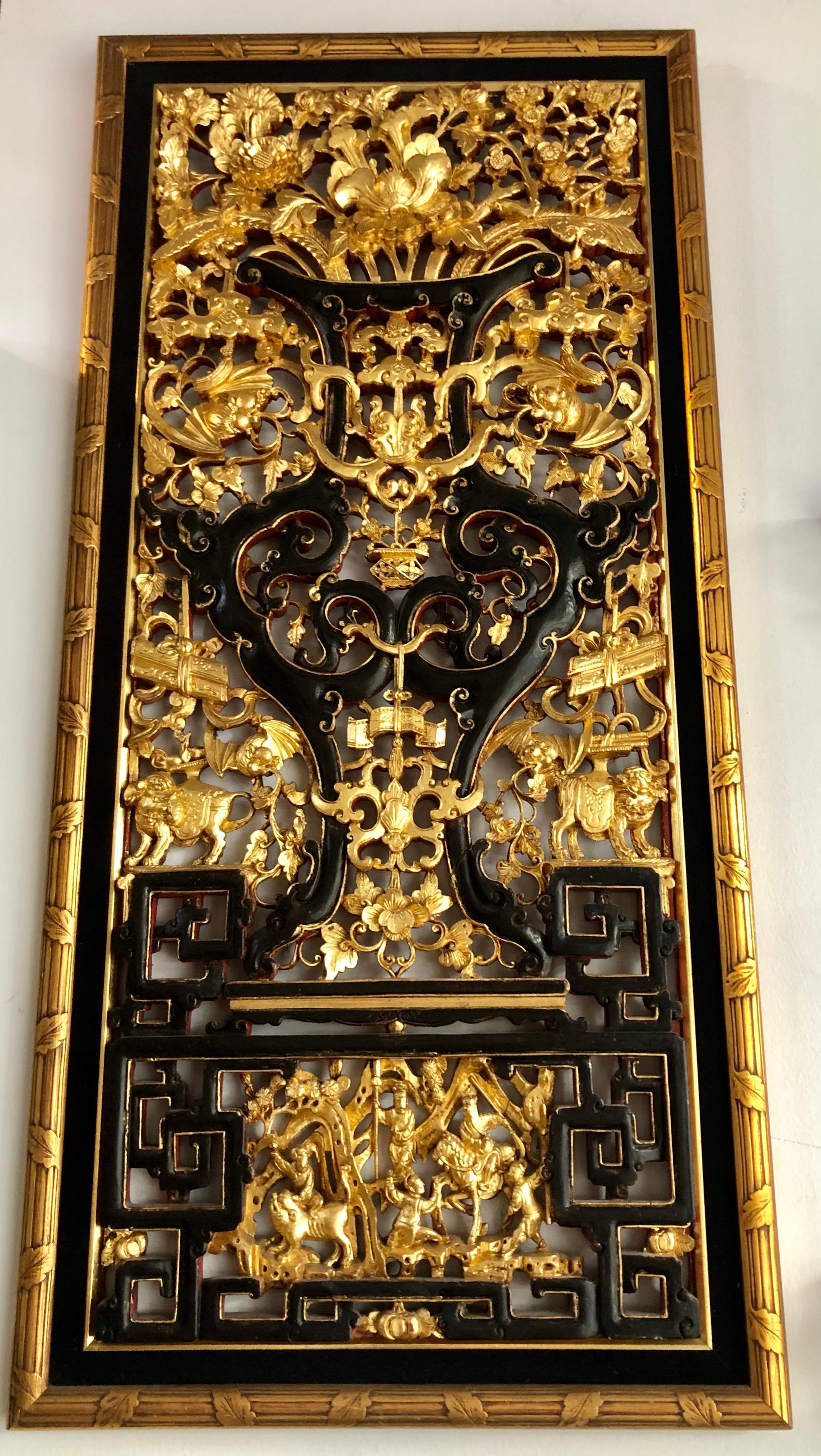 Early 20th century Chinese gilded carved wood wall panels in very good condition 
Measures: 40 inches high x 18.5 inches wide x 2 inches deep.