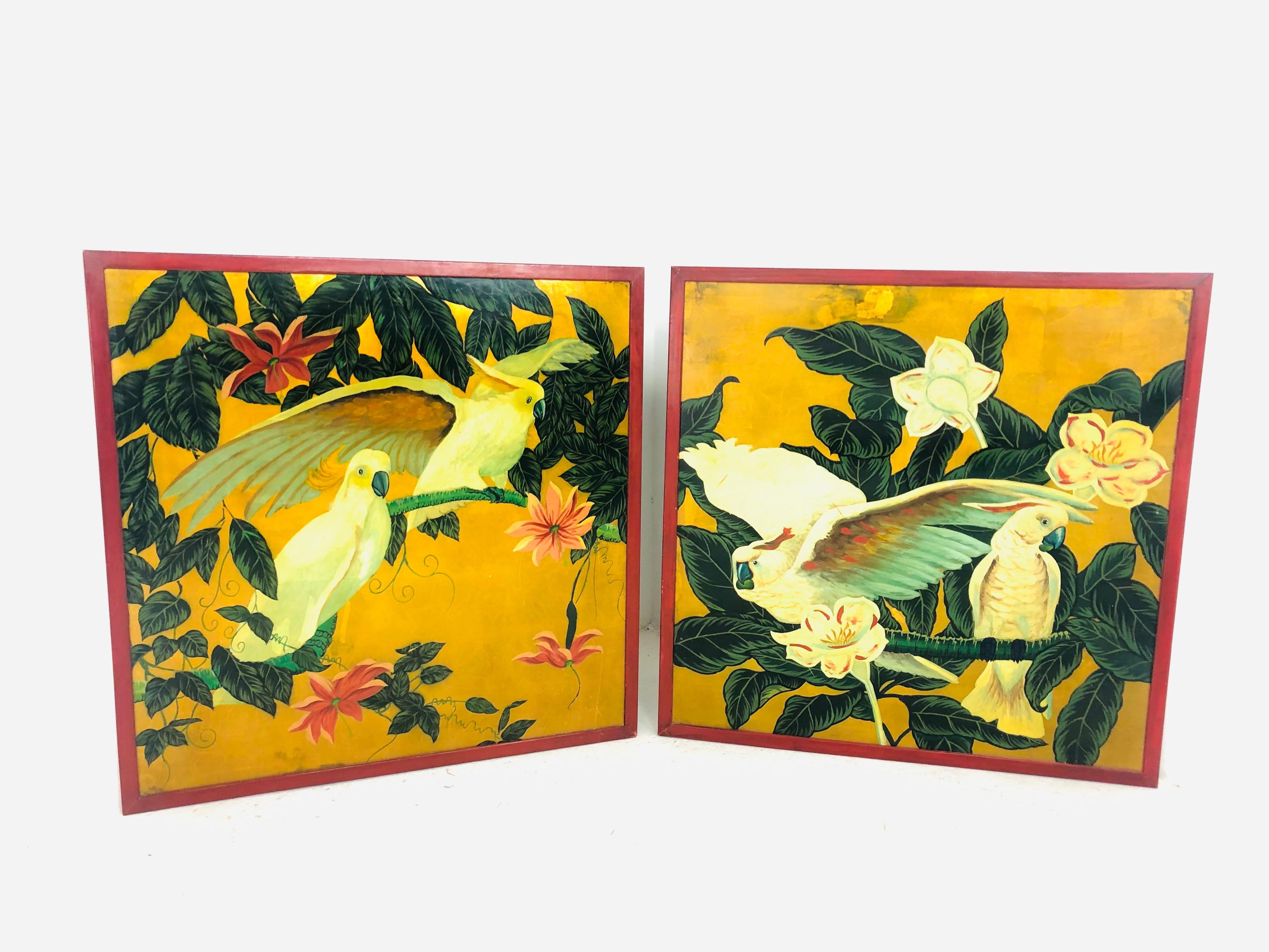 Gorgeous pair of large vintage Cockatoo paintings on wood. Red lacquer frames. Good condition but one has a clear shiny finish while the other is clear matte.