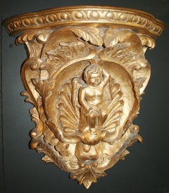 Pair of Gilded Hand-Carved Cherubic Wall Brackets