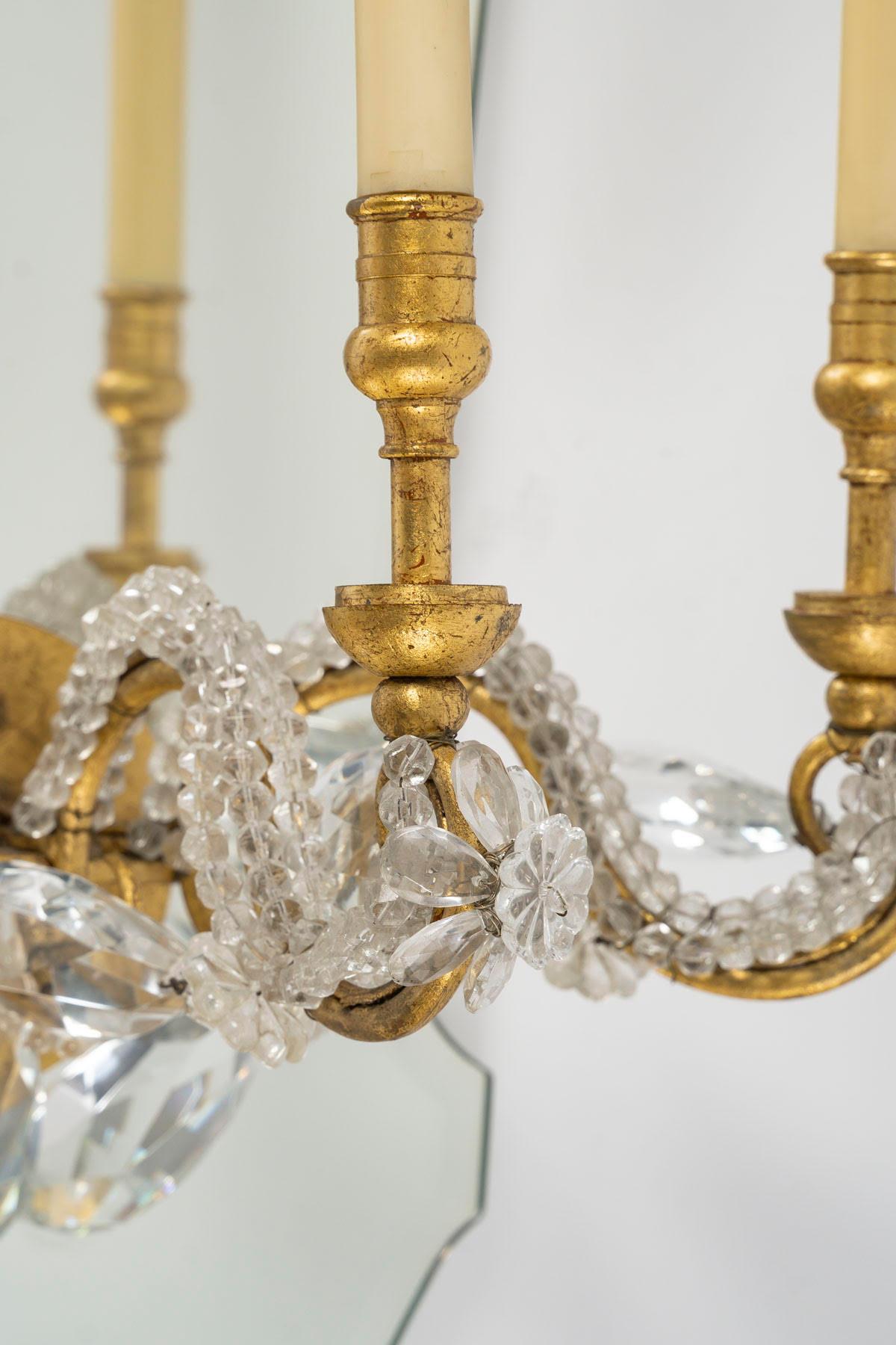 French Pair of Gilded Iron and Mirror Sconces with Glass Drops, 1950-1960. For Sale