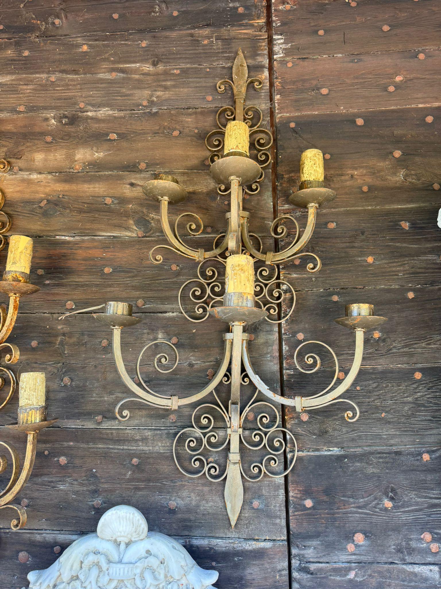 Gilt Pair of gilded iron wall sconces with 6 lights each, Italy For Sale