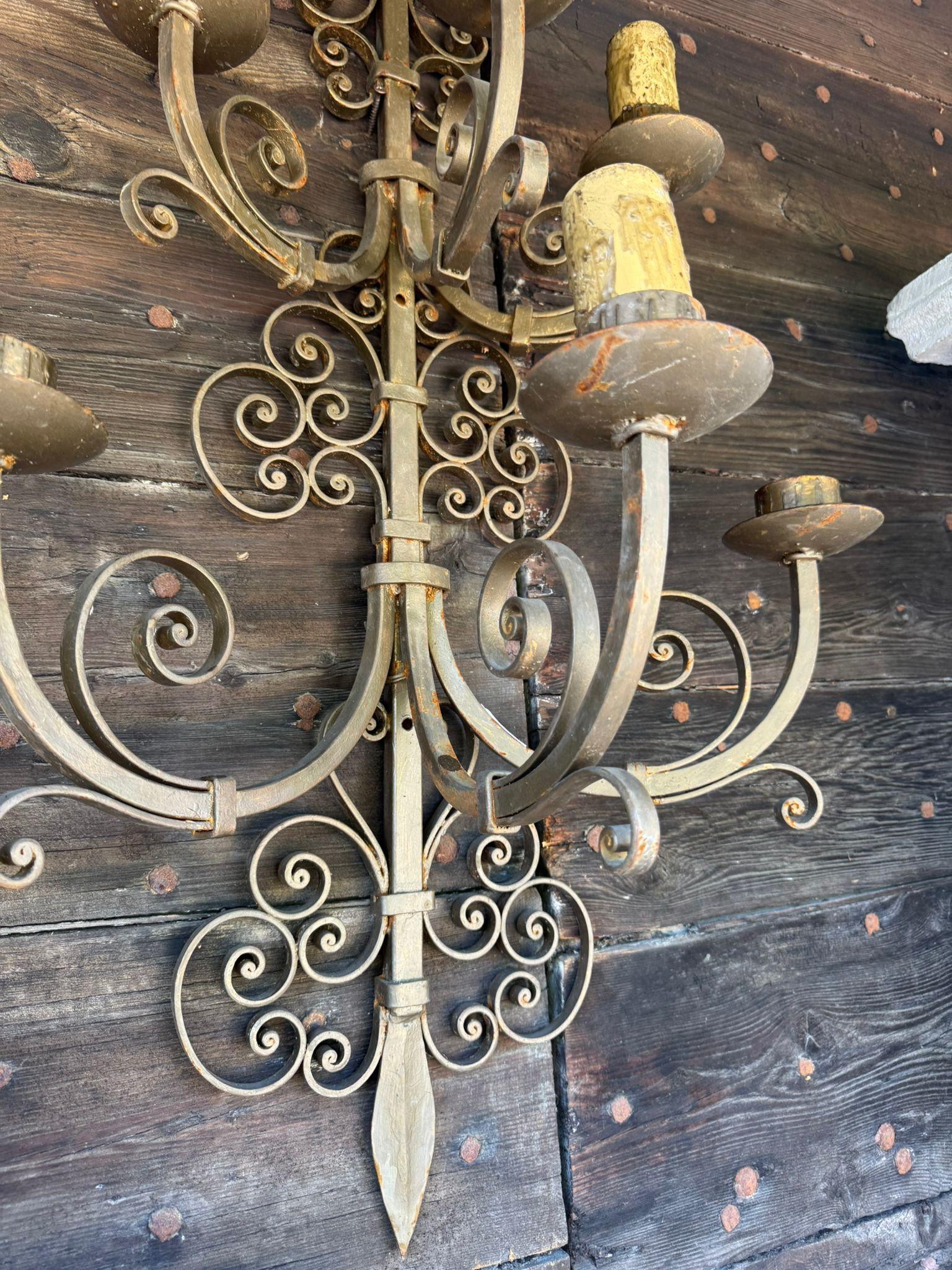 Iron Pair of gilded iron wall sconces with 6 lights each, Italy For Sale