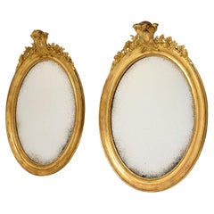 Pair of Gilded Oval Mirrors