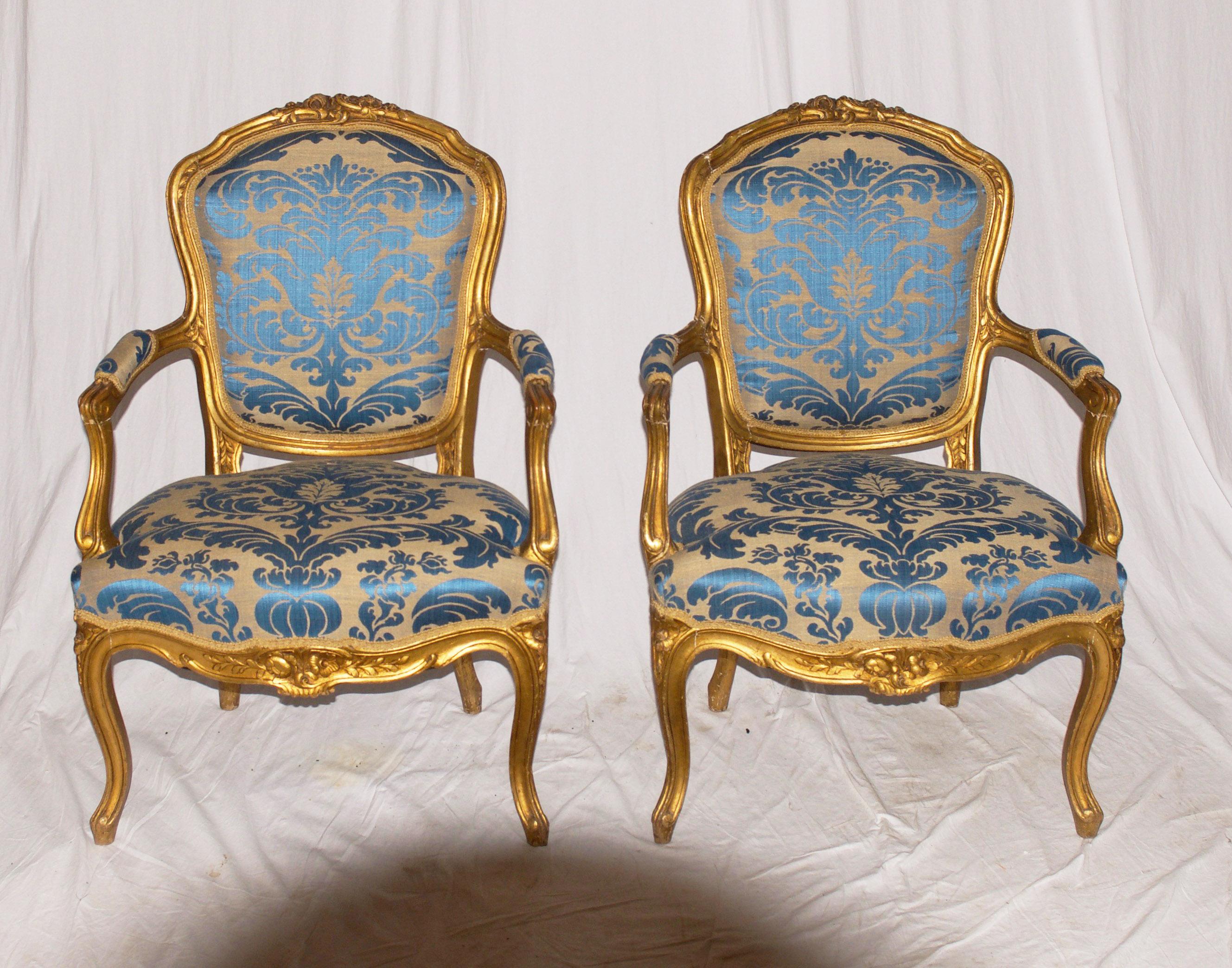 Early 19th Century Pair of Gilded Rococo Armchairs